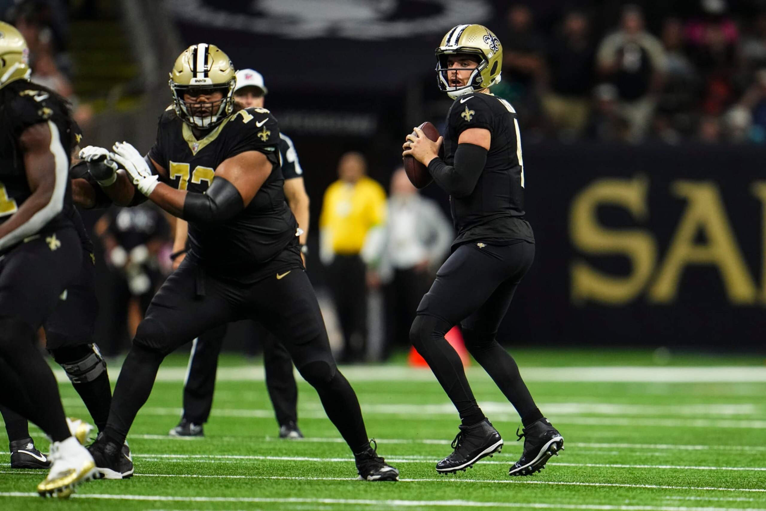 NEW ORLEANS, LA - OCTOBER 19: Derek Carr #4 of the New Orleans Saints drops back to pass during an NFL football game against the Jacksonville Jaguars at Caesars Superdome on October 19, 2023 in New Orleans, Louisiana. (Photo by Cooper Neill/Getty Images)