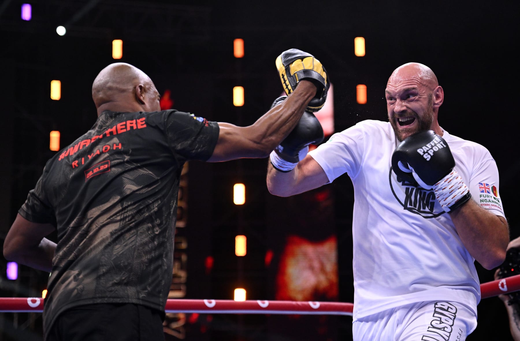 RIYADH, SAUDI ARABIA - OCTOBER 25: Tyson Fury works out with trainer Sugar-Hill Steward during a public workout ahead of the Tyson Fury v Francis Ngannou boxing match at Boulevard Hall on October 25, 2023 in Riyadh, Saudi Arabia. (Photo by Justin Setterfield/Getty Images)