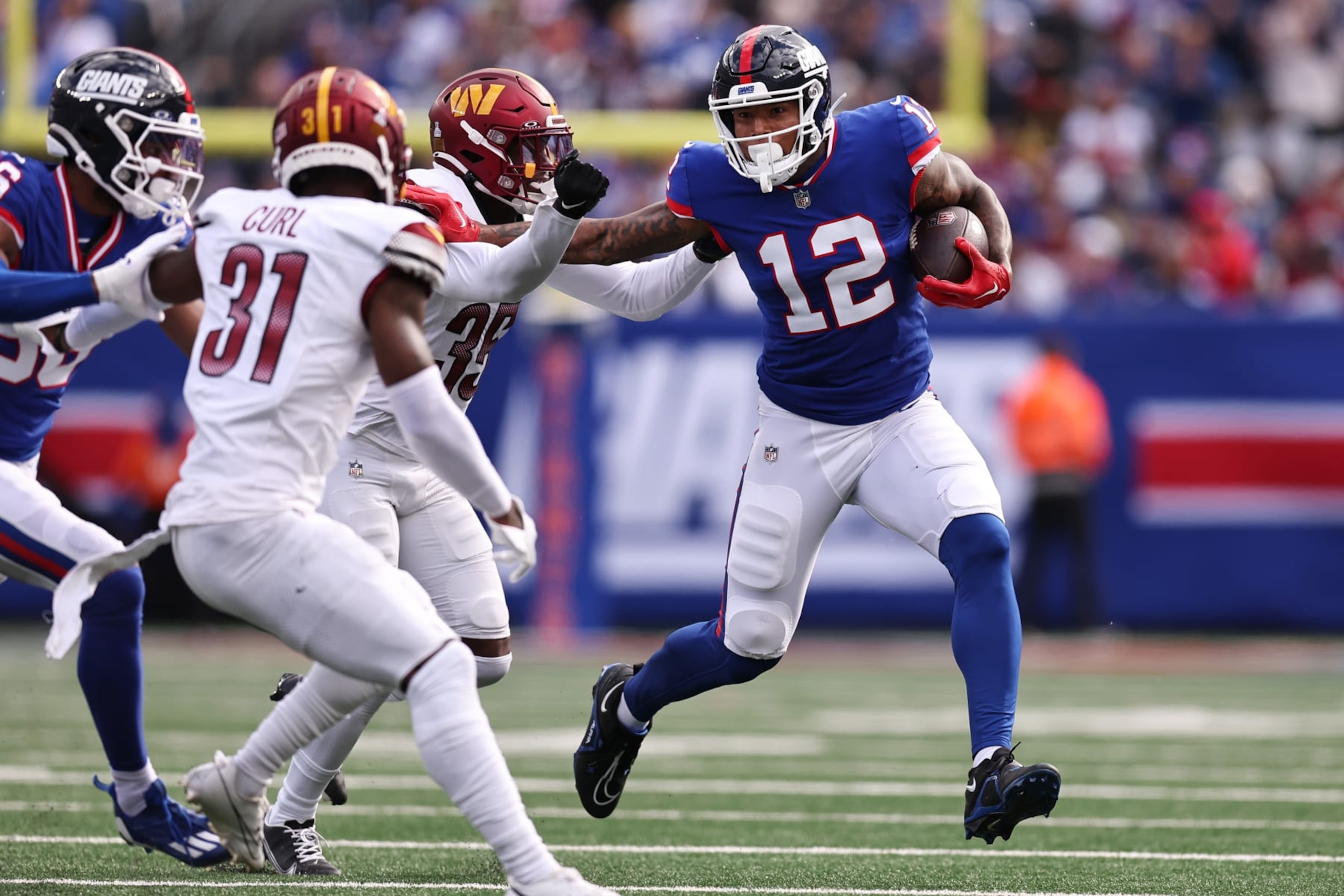 EAST RUTHERFORD, NEW JERSEY - OCTOBER 22: Darren Waller #12 of the New York Giants carries the ball against the Washington Commanders during the first half of the game at MetLife Stadium on October 22, 2023 in East Rutherford, New Jersey. (Photo by Dustin Satloff/Getty Images) EAST RUTHERFORD, NEW JERSEY - OCTOBER 22: Darren Waller #12 of the New York Giants carries the ball against the Washington Commanders during the first half of the game at MetLife Stadium on October 22, 2023 in East Rutherford, New Jersey. (Photo by Dustin Satloff/Getty Images)
