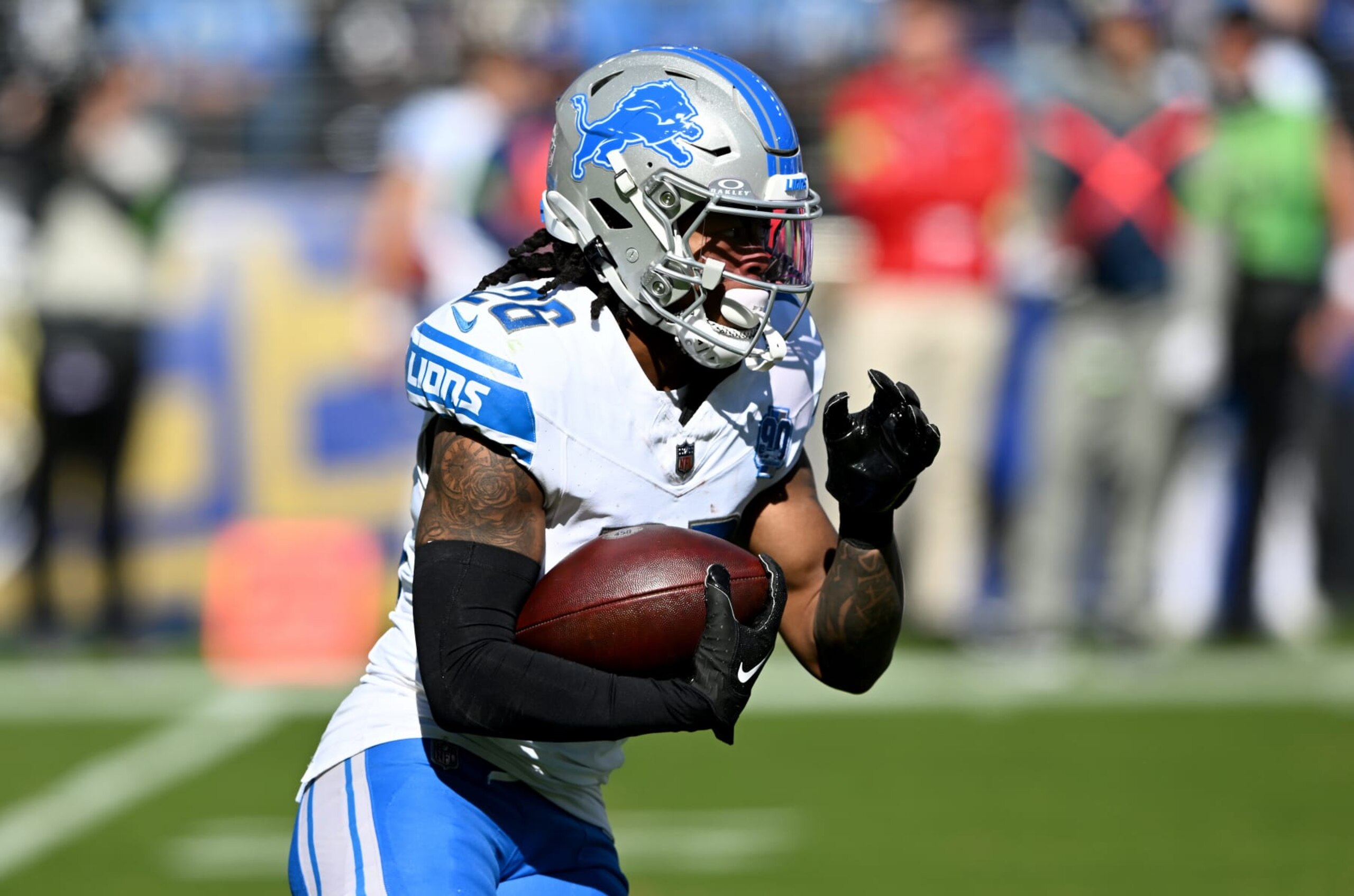 BALTIMORE, MARYLAND - OCTOBER 22: Jahmyr Gibbs #26 of the Detroit Lions rushes the ball against the Baltimore Ravens at M&T Bank Stadium on October 22, 2023 in Baltimore, Maryland. (Photo by G Fiume/Getty Images) BALTIMORE, MARYLAND - OCTOBER 22: Jahmyr Gibbs #26 of the Detroit Lions rushes the ball against the Baltimore Ravens at M&T Bank Stadium on October 22, 2023 in Baltimore, Maryland. (Photo by G Fiume/Getty Images)