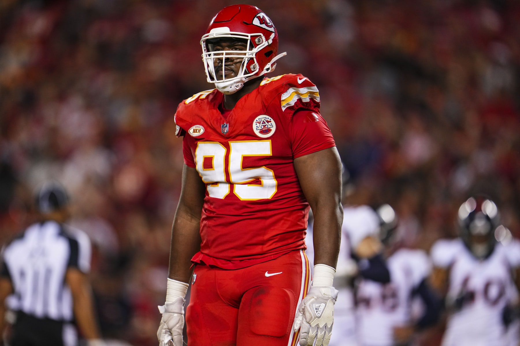 KANSAS CITY, MO - OCTOBER 12: Chris Jones #95 of the Kansas City Chiefs looks on from the field during an NFL football game against the Denver Broncos at GEHA Field at Arrowhead Stadium on October 12, 2023 in Kansas City, Missouri. (Photo by Cooper Neill/Getty Images)