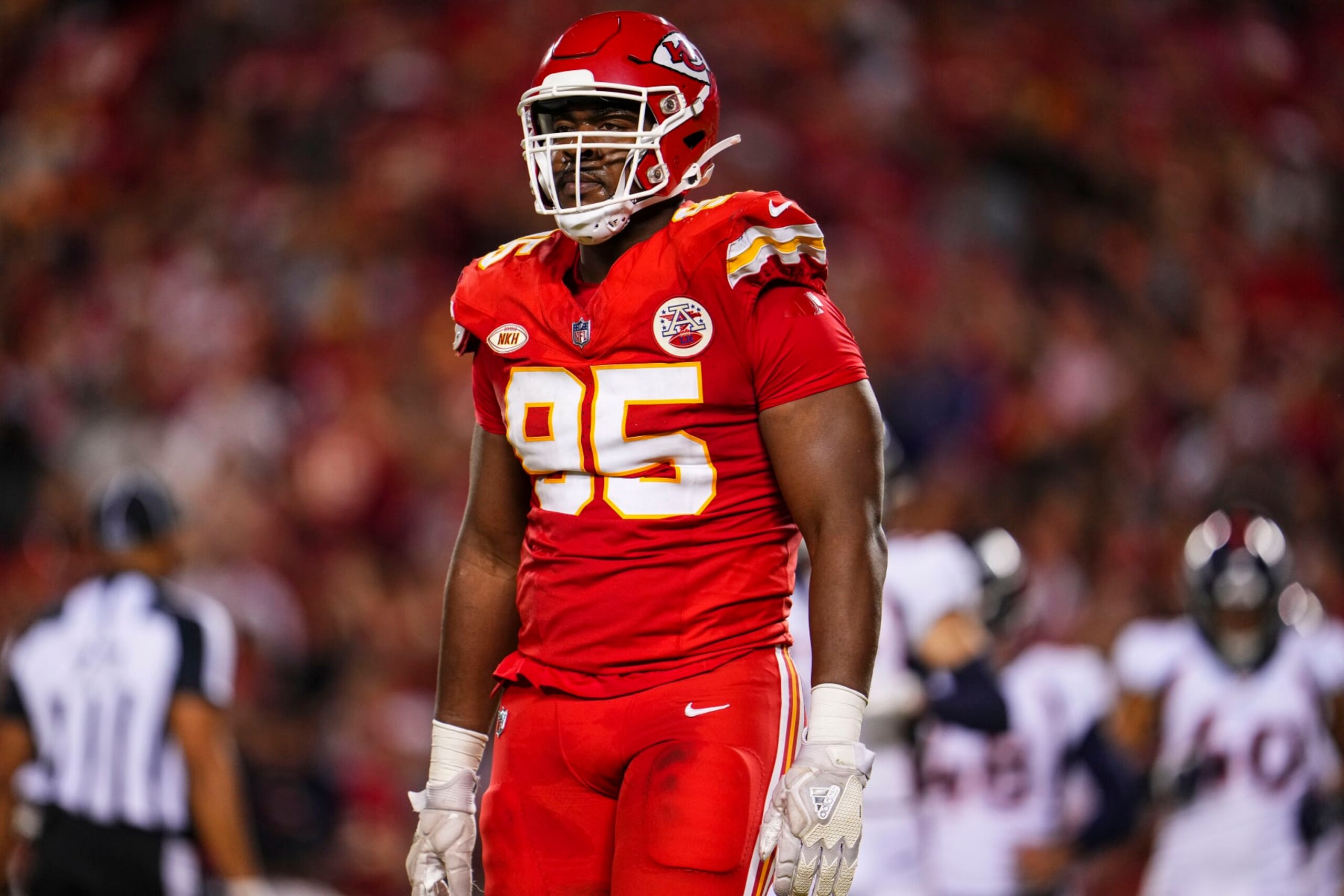 KANSAS CITY, MO - OCTOBER 12: Chris Jones #95 of the Kansas City Chiefs looks on from the field during an NFL football game against the Denver Broncos at GEHA Field at Arrowhead Stadium on October 12, 2023 in Kansas City, Missouri. (Photo by Cooper Neill/Getty Images) KANSAS CITY, MO - OCTOBER 12: Chris Jones #95 of the Kansas City Chiefs looks on from the field during an NFL football game against the Denver Broncos at GEHA Field at Arrowhead Stadium on October 12, 2023 in Kansas City, Missouri. (Photo by Cooper Neill/Getty Images)