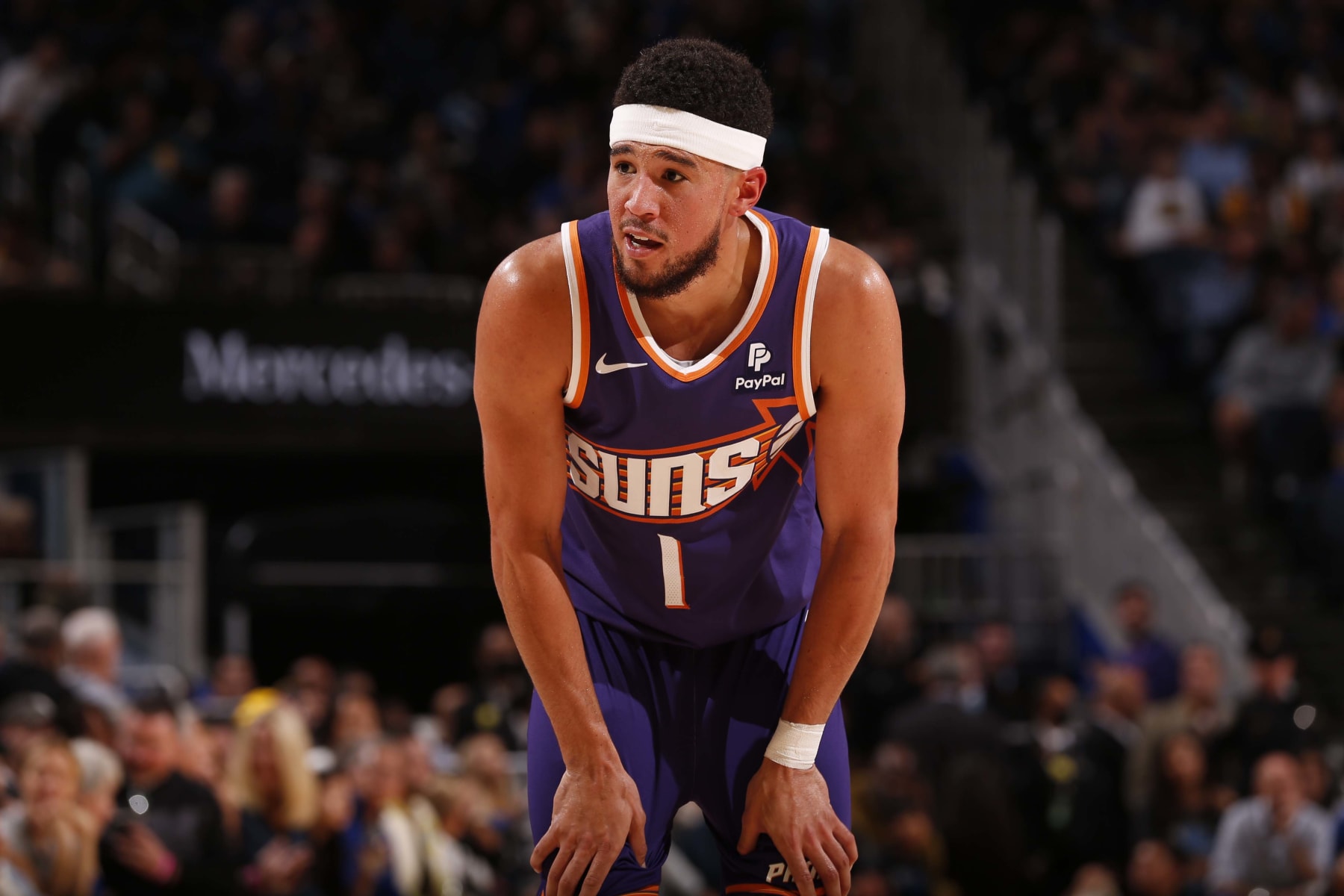 SAN FRANCISCO, CA - OCTOBER 24: Devin Booker #1 of the Phoenix Suns looks on during the game against the Golden State Warriors on October 24, 2023 at Chase Center in San Francisco, California. NOTE TO USER: User expressly acknowledges and agrees that, by downloading and or using this photograph, user is consenting to the terms and conditions of Getty Images License Agreement. Mandatory Copyright Notice: Copyright 2023 NBAE (Photo by Jed Jacobsohn/NBAE via Getty Images)