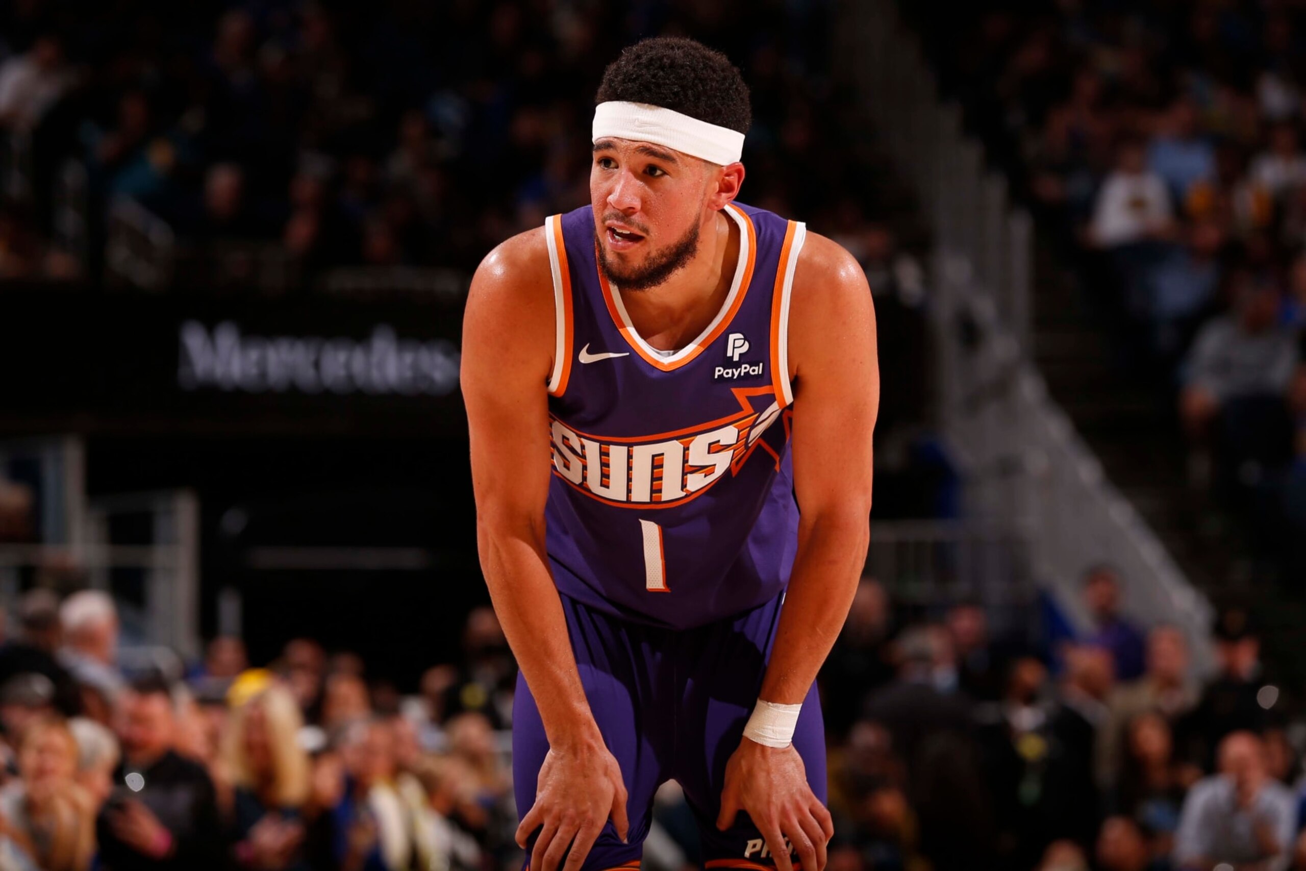 SAN FRANCISCO, CA - OCTOBER 24: Devin Booker #1 of the Phoenix Suns looks on during the game against the Golden State Warriors on October 24, 2023 at Chase Center in San Francisco, California. NOTE TO USER: User expressly acknowledges and agrees that, by downloading and or using this photograph, user is consenting to the terms and conditions of Getty Images License Agreement. Mandatory Copyright Notice: Copyright 2023 NBAE (Photo by Jed Jacobsohn/NBAE via Getty Images)