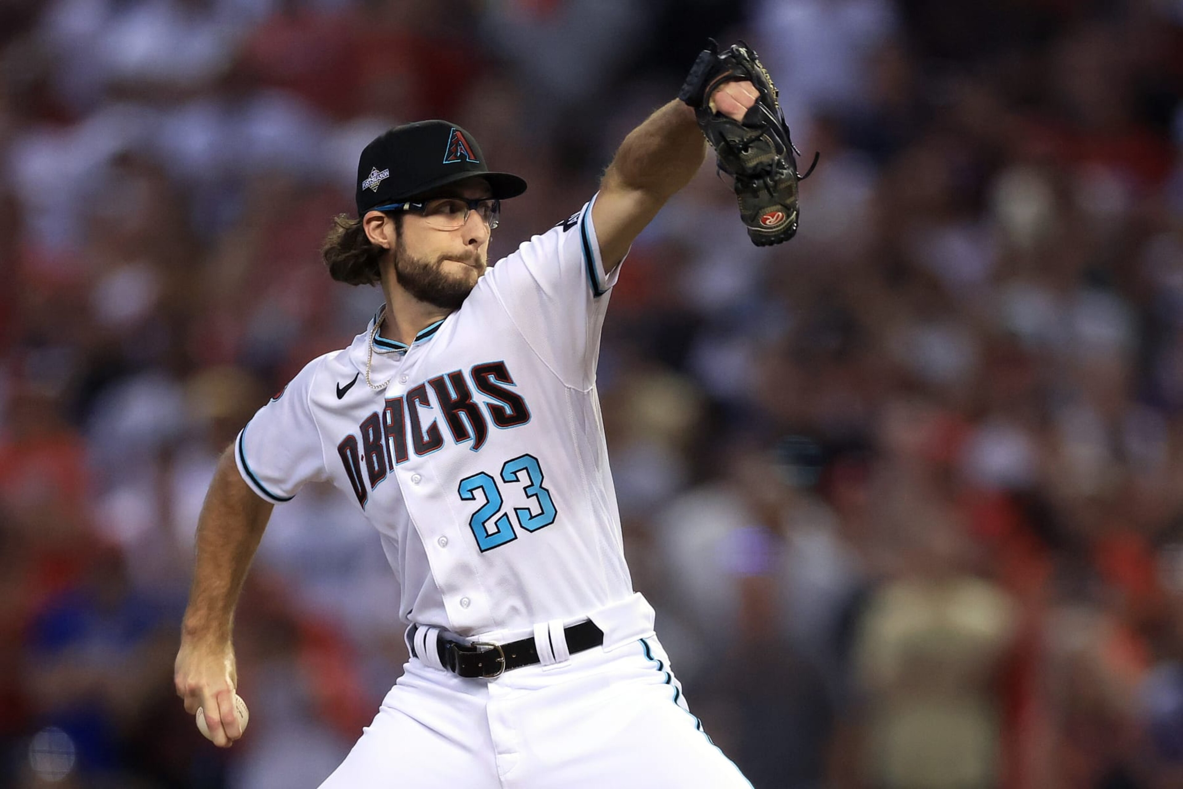 PHOENIX, ARIZONA - OCTOBER 21: Zac Gallen #23 of the Arizona Diamondbacks throws a pitch against the Philadelphia Phillies during the first inning  during Game Five of the Championship Series at Chase Field on October 21, 2023 in Phoenix, Arizona. (Photo by Sean M. Haffey/Getty Images)