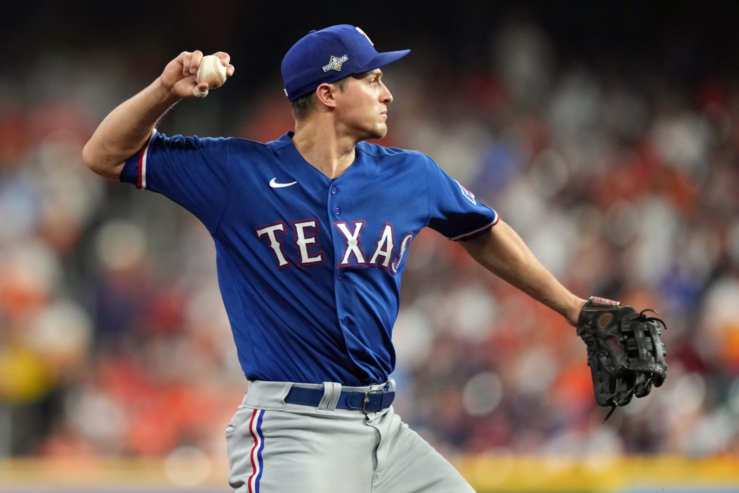 HOUSTON, TX - OCTOBER 23: Corey Seager #5 of the Texas Rangers throws to first base for an out in the fifth inning during Game 7 of the ALCS between the Texas Rangers and the Houston Astros at Minute Maid Park on Monday, October 23, 2023 in Houston, Texas. (Photo by Alex Bierens de Haan/MLB Photos via Getty Images)