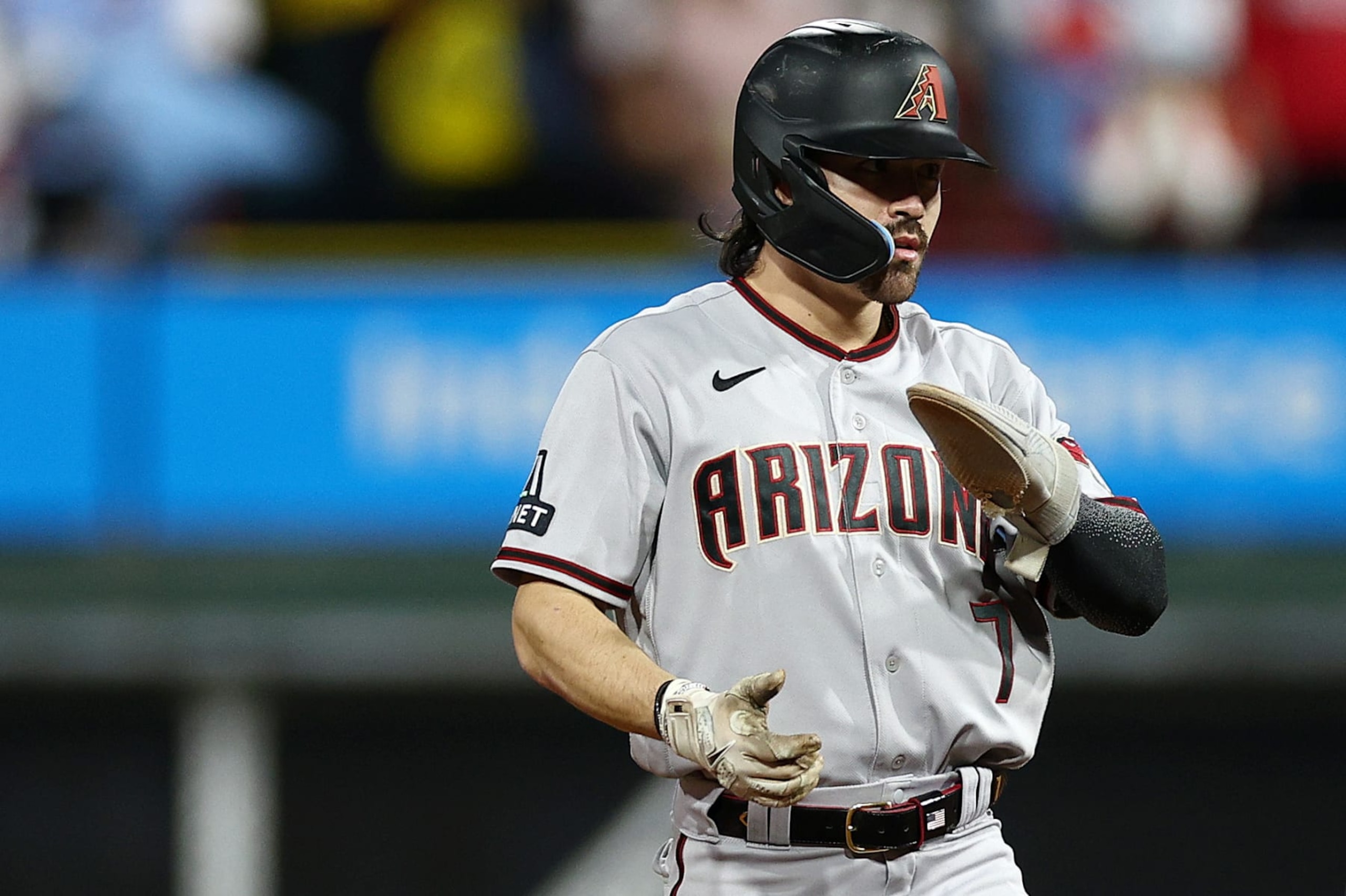 PHILADELPHIA, PENNSYLVANIA - OCTOBER 24: Corbin Carroll #7 of the Arizona Diamondbacks reacts after stealing second base against the Philadelphia Phillies during the third inning in Game Seven of the Championship Series at Citizens Bank Park on October 24, 2023 in Philadelphia, Pennsylvania. (Photo by Elsa/Getty Images)