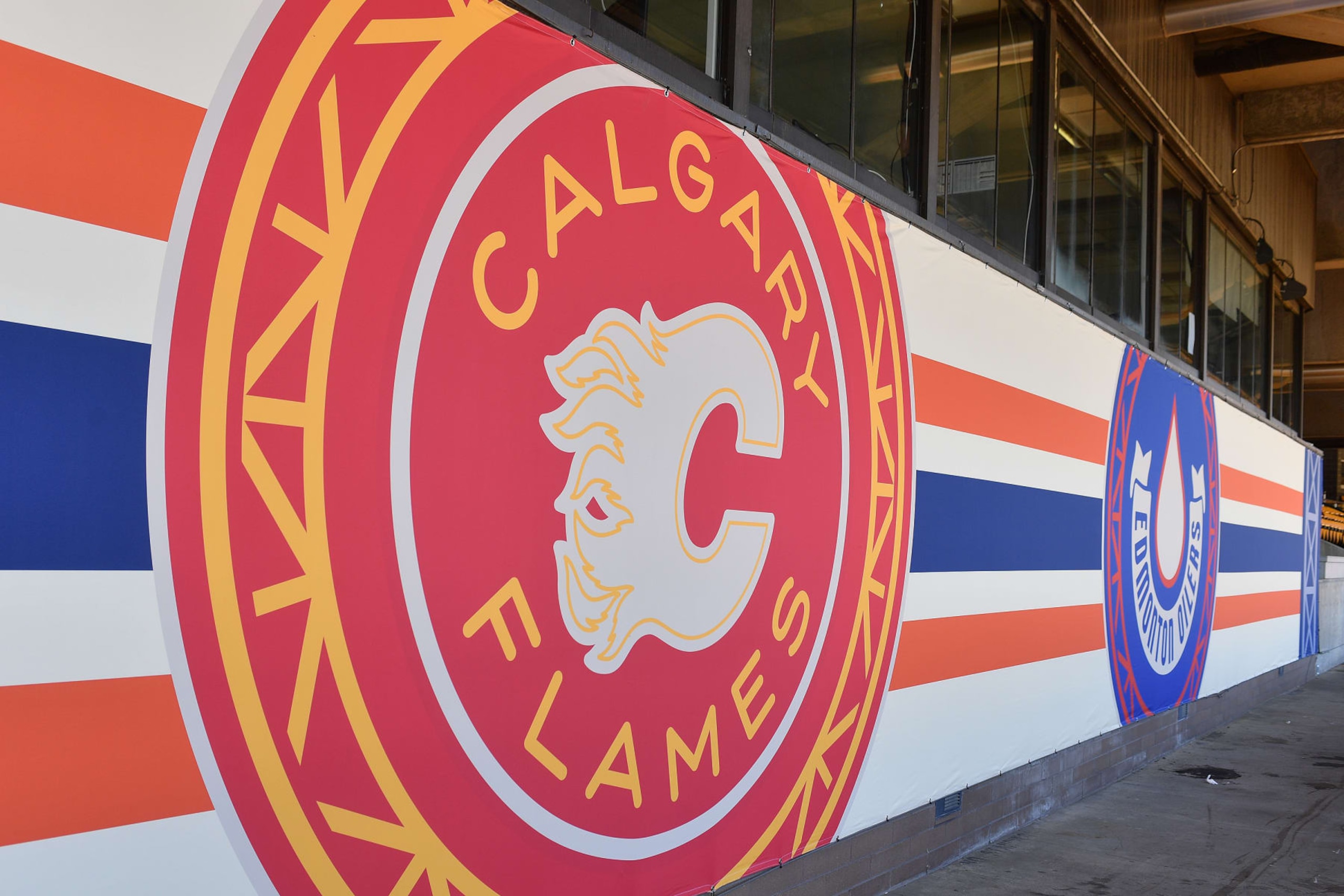 EDMONTON, CANADA - OCTOBER 19: A view of the Calgary Flames and Edmonton Oilers logos for the 2023 Tim Hortons NHL Heritage Classic at Commonwealth Stadium on October 19, 2023, in Edmonton, Alberta, Canada. (Photo by Andy Devlin/NHLI via Getty Images) EDMONTON, CANADA - OCTOBER 19: A view of the Calgary Flames and Edmonton Oilers logos for the 2023 Tim Hortons NHL Heritage Classic at Commonwealth Stadium on October 19, 2023, in Edmonton, Alberta, Canada. (Photo by Andy Devlin/NHLI via Getty Images)
