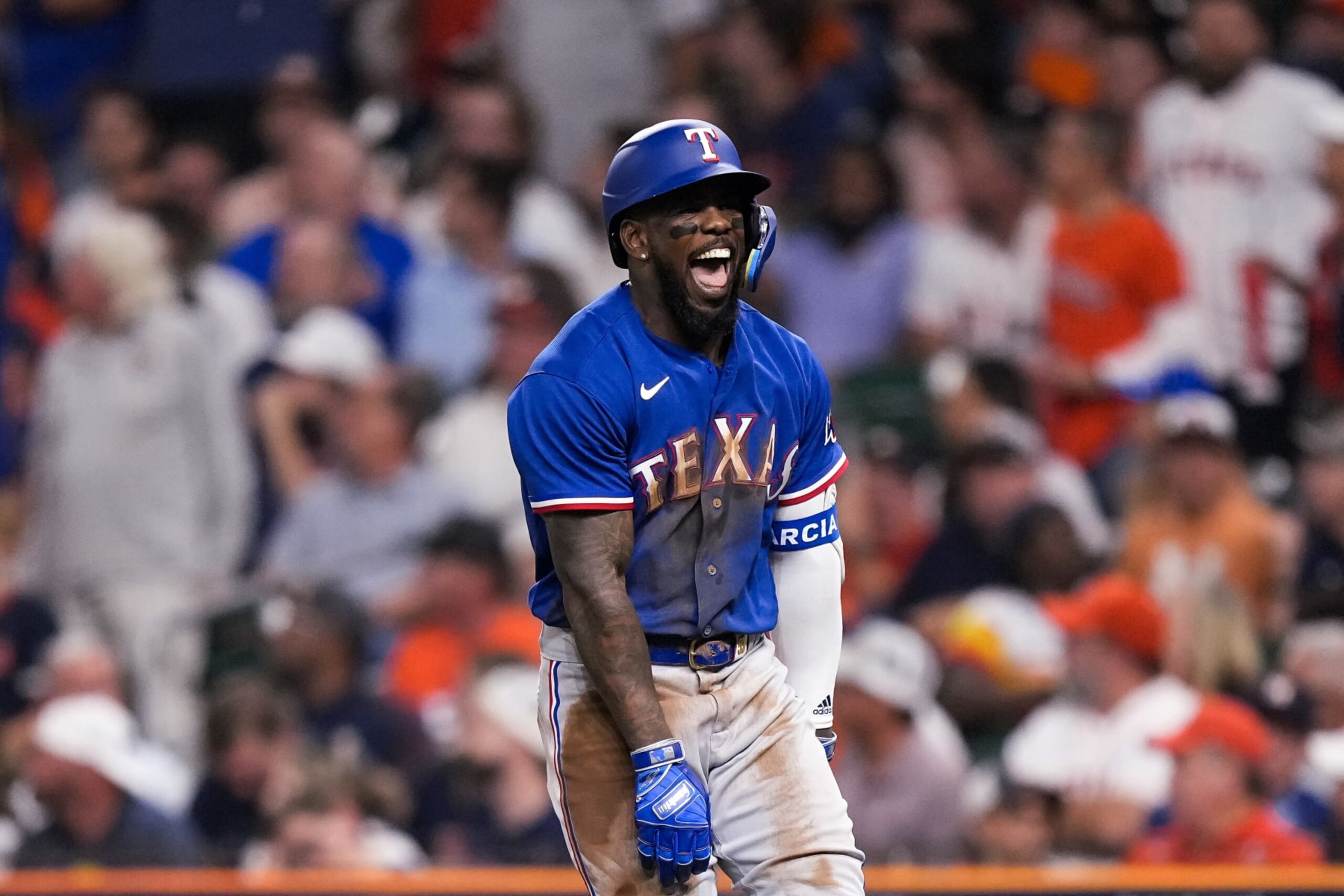 HOUSTON, TX - OCTOBER 23: Adolis Garcia #53 of the Texas Rangers celebrates after hitting a home run against Hunter Brown #58 of the Houston Astros during the third inning of Game Seven of the American League Championship Series at Minute Maid Park on October 23, 2023 in Houston, Texas. (Photo by Bailey Orr/Texas Rangers/Getty Images)