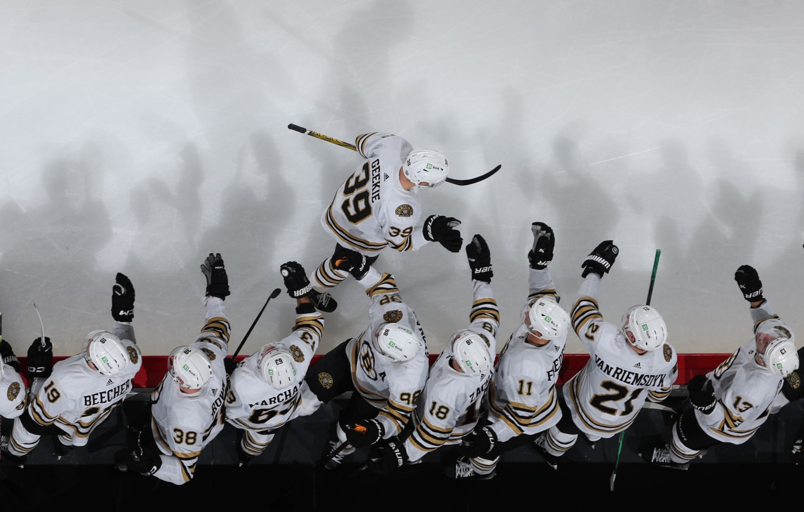 CHICAGO, ILLINOIS - OCTOBER 24: Morgan Geekie #39 of the Boston Bruins celebrates at the bench after the Bruins score in the third period against the Chicago Blackhawks at the United Center on October 24, 2023 in Chicago, Illinois. (Photo by Chase Agnello-Dean/NHLI via Getty Images) CHICAGO, ILLINOIS - OCTOBER 24: Morgan Geekie #39 of the Boston Bruins celebrates at the bench after the Bruins score in the third period against the Chicago Blackhawks at the United Center on October 24, 2023 in Chicago, Illinois. (Photo by Chase Agnello-Dean/NHLI via Getty Images)