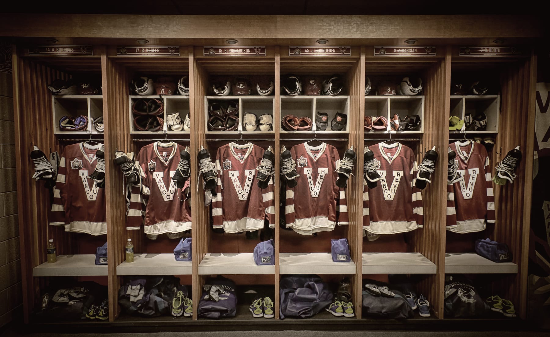 VANCOUVER, CANADA - MARCH 2: (EDITORIAL USE ONLY) (EDITORS NOTE: This image has been altered: A digital filter was used)Vancuver Cannucks jerseys hang in the locker room prior to the start of the 2014 Tim Hortons NHL Heritage Classic game against the Ottawa Senators at BC Place on March 2, 2014 in Vancouver, British Columbia, Canada. (Photo by Dave Sandford/NHLI via Getty Images)