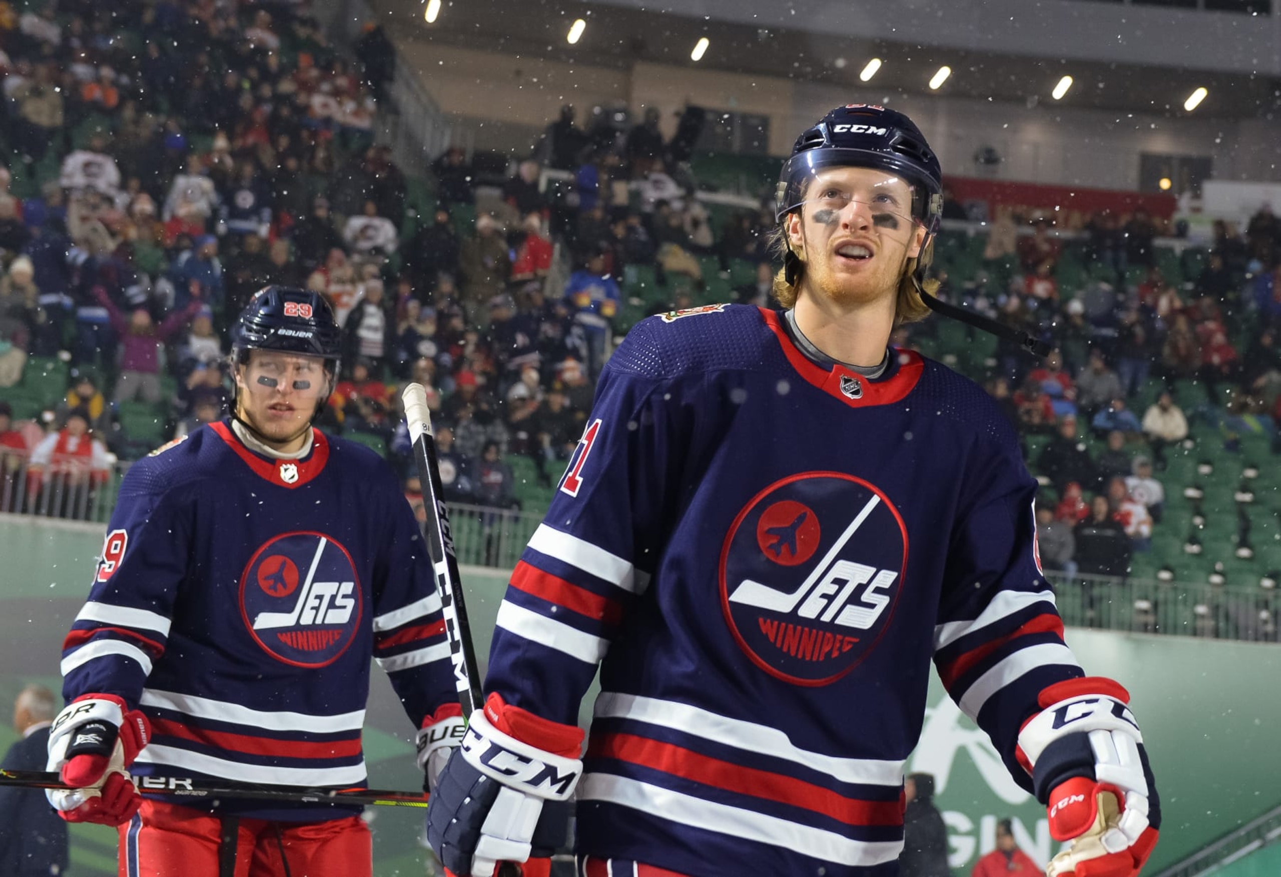 REGINA, SK - OCTOBER 26: Kyle Connor #81 of the Winnipeg Jets walks to the ice for the second period against the Calgary Flames during the 2019 Tim Hortons NHL Heritage Classic at Mosaic Stadium on October 26, 2019 in Regina, Saskatchewan, Canada. (Photo by Minas Panagiotakis/NHLI via Getty Images) REGINA, SK - OCTOBER 26: Kyle Connor #81 of the Winnipeg Jets walks to the ice for the second period against the Calgary Flames during the 2019 Tim Hortons NHL Heritage Classic at Mosaic Stadium on October 26, 2019 in Regina, Saskatchewan, Canada. (Photo by Minas Panagiotakis/NHLI via Getty Images)