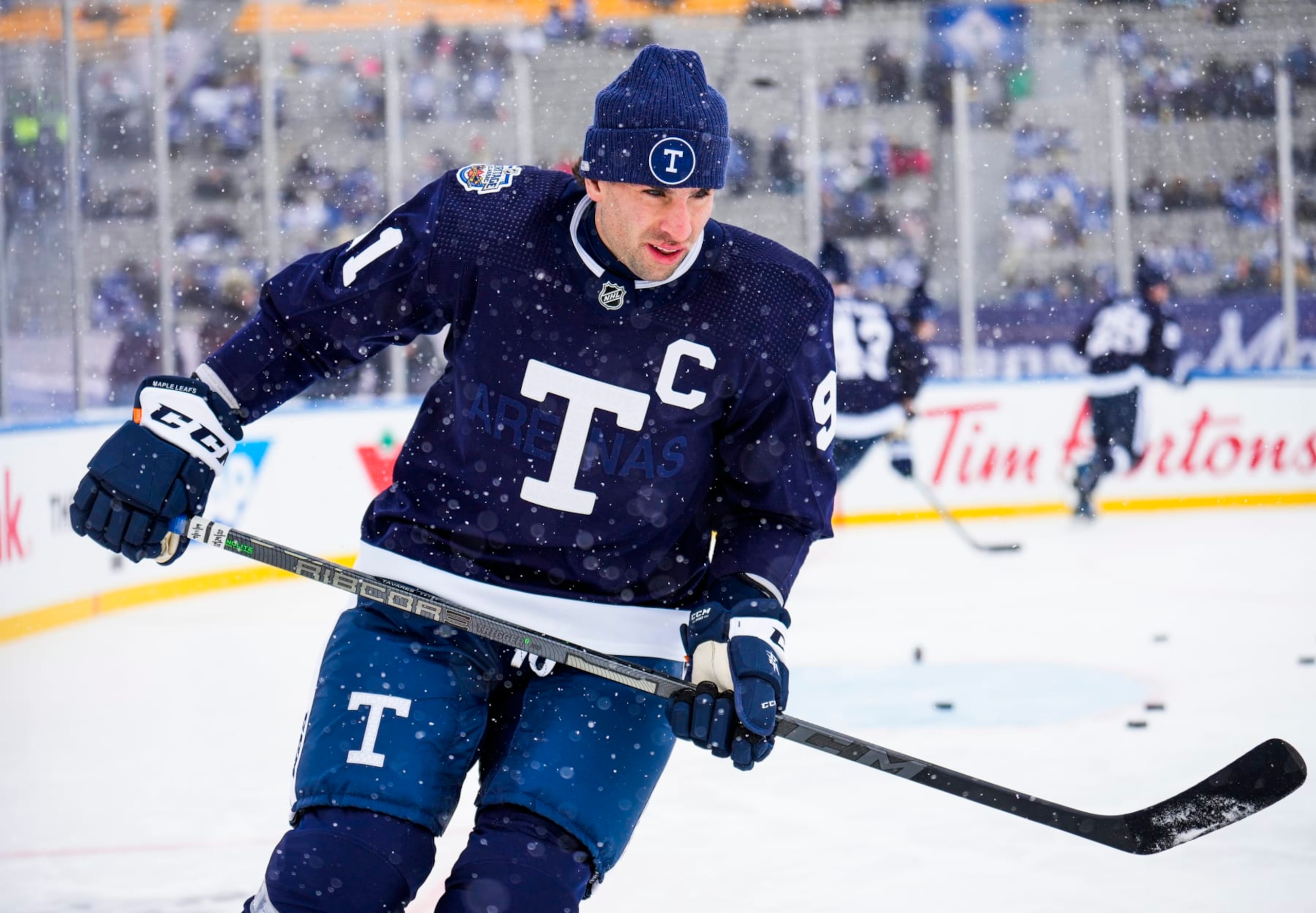 HAMILTON, ON - MARCH 13: John Tavares #91 of the Toronto Maple Leafs takes part in warm up ahead of the 2022 Heritage Classic against the Buffalo Sabres at Tim Hortons Field on March 13, 2022 in Hamilton, Ontario, Canada. (Photo by Mark Blinch/NHLI via Getty Images) HAMILTON, ON - MARCH 13: John Tavares #91 of the Toronto Maple Leafs takes part in warm up ahead of the 2022 Heritage Classic against the Buffalo Sabres at Tim Hortons Field on March 13, 2022 in Hamilton, Ontario, Canada. (Photo by Mark Blinch/NHLI via Getty Images)