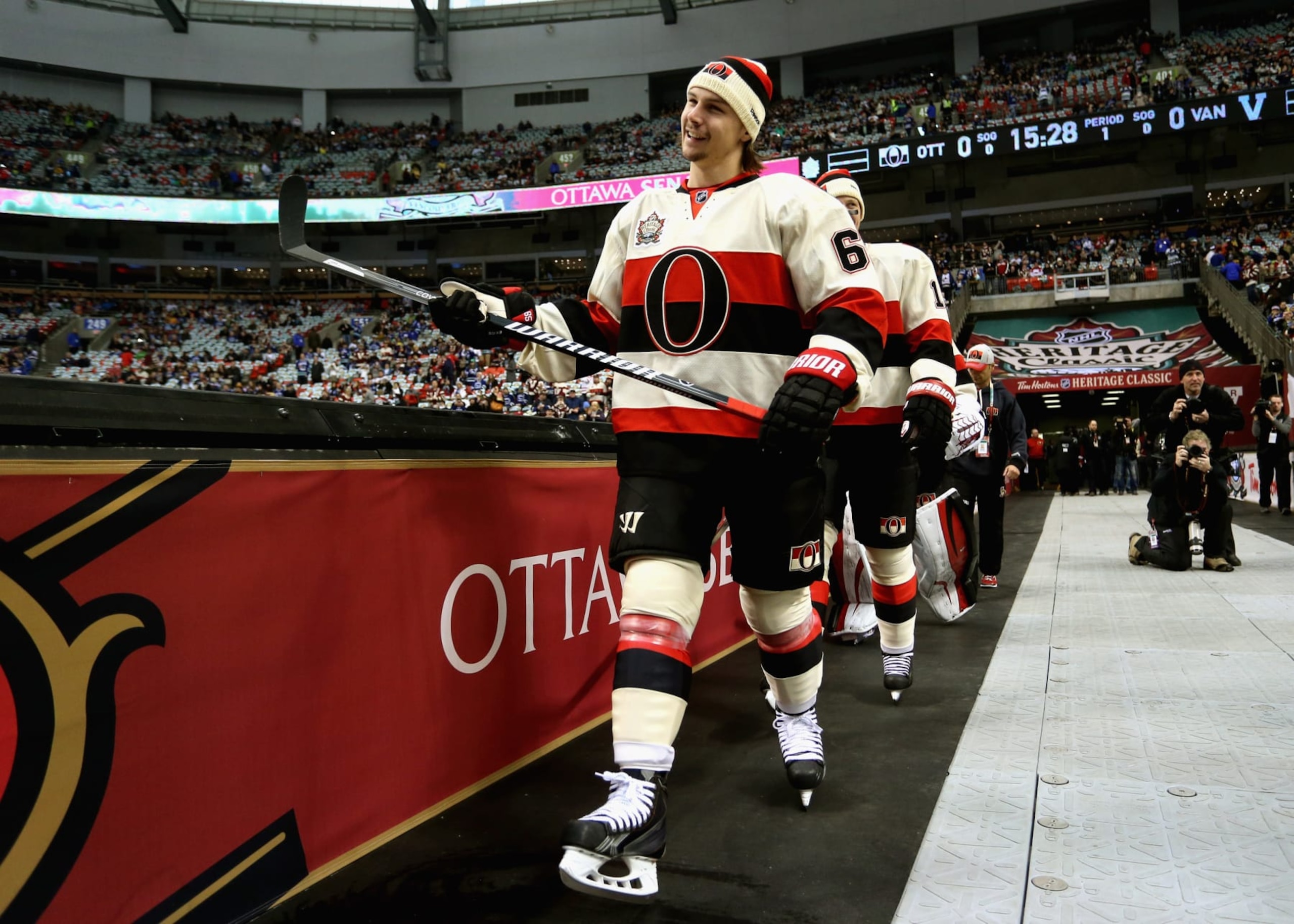 VANCOUVER, BC - MARCH 02: (EDITORIAL USE ONLY) Erik Karlsson #65 of the Ottawa Senators walks out before playing the Vancouver Canucks during the 2014 Tim Hortons NHL Heritage Classic game at BC Place on March 2, 2014 in Vancouver, British Columbia, Canada. (Photo by Andre Ringuette/NHLI via Getty Images) VANCOUVER, BC - MARCH 02: (EDITORIAL USE ONLY) Erik Karlsson #65 of the Ottawa Senators walks out before playing the Vancouver Canucks during the 2014 Tim Hortons NHL Heritage Classic game at BC Place on March 2, 2014 in Vancouver, British Columbia, Canada. (Photo by Andre Ringuette/NHLI via Getty Images)