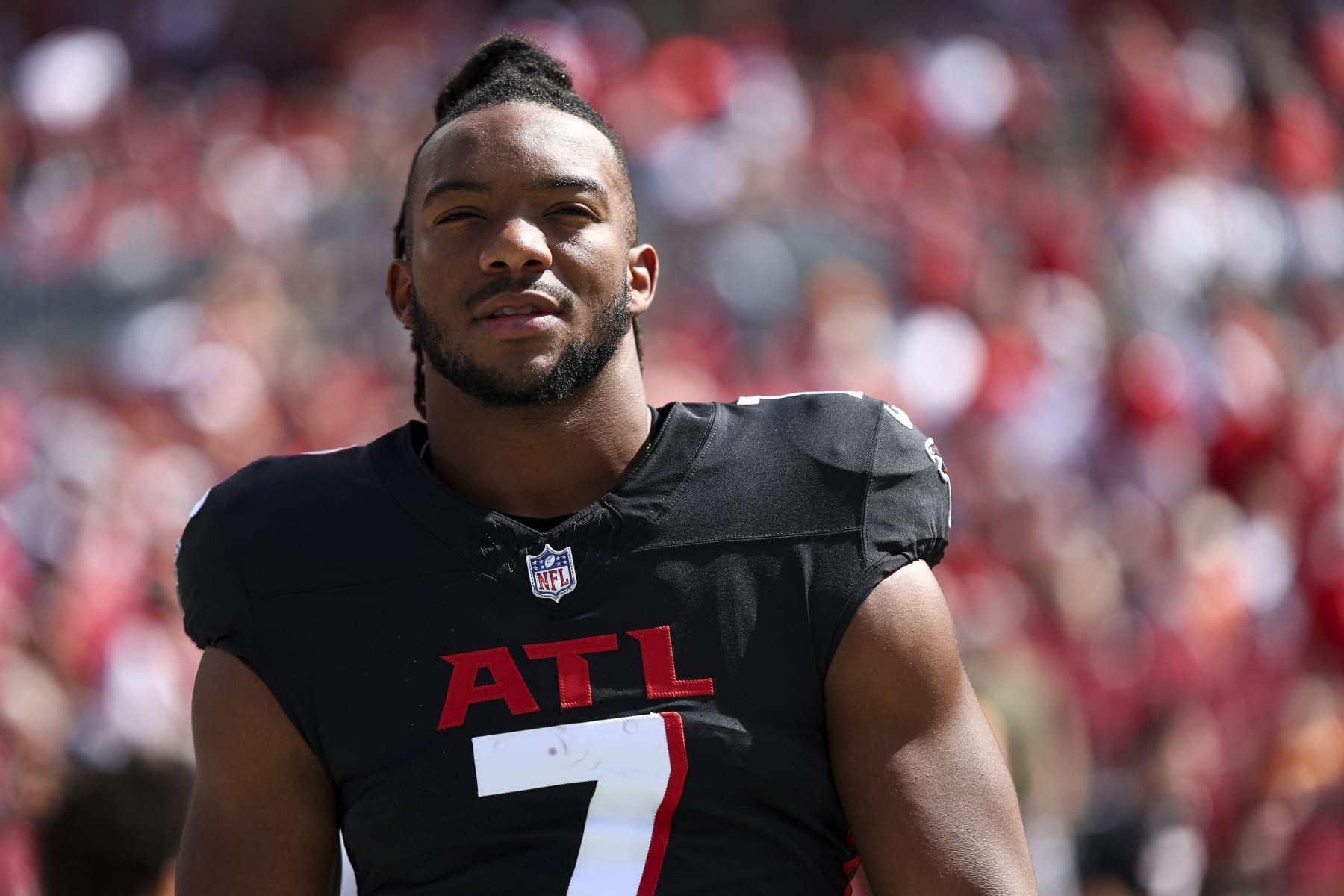 TAMPA, FL - OCTOBER 22: Bijan Robinson #7 of the Atlanta Falcons stands on the sidelines during the national anthem prior to an NFL football game against the Tampa Bay Buccaneers at Raymond James Stadium on October 22, 2023 in Tampa, Florida. (Photo by Kevin Sabitus/Getty Images)