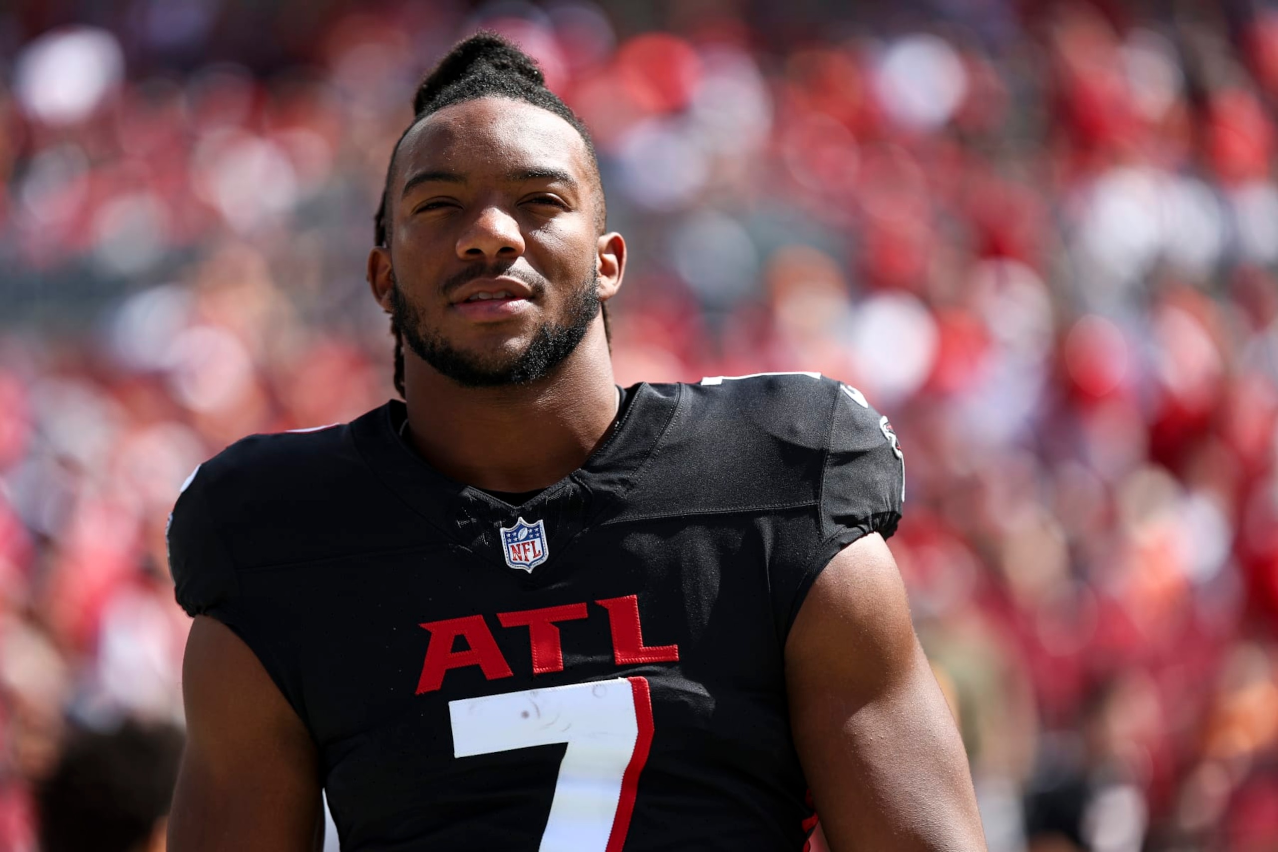 TAMPA, FL - OCTOBER 22: Bijan Robinson #7 of the Atlanta Falcons stands on the sidelines during the national anthem prior to an NFL football game against the Tampa Bay Buccaneers at Raymond James Stadium on October 22, 2023 in Tampa, Florida. (Photo by Kevin Sabitus/Getty Images)