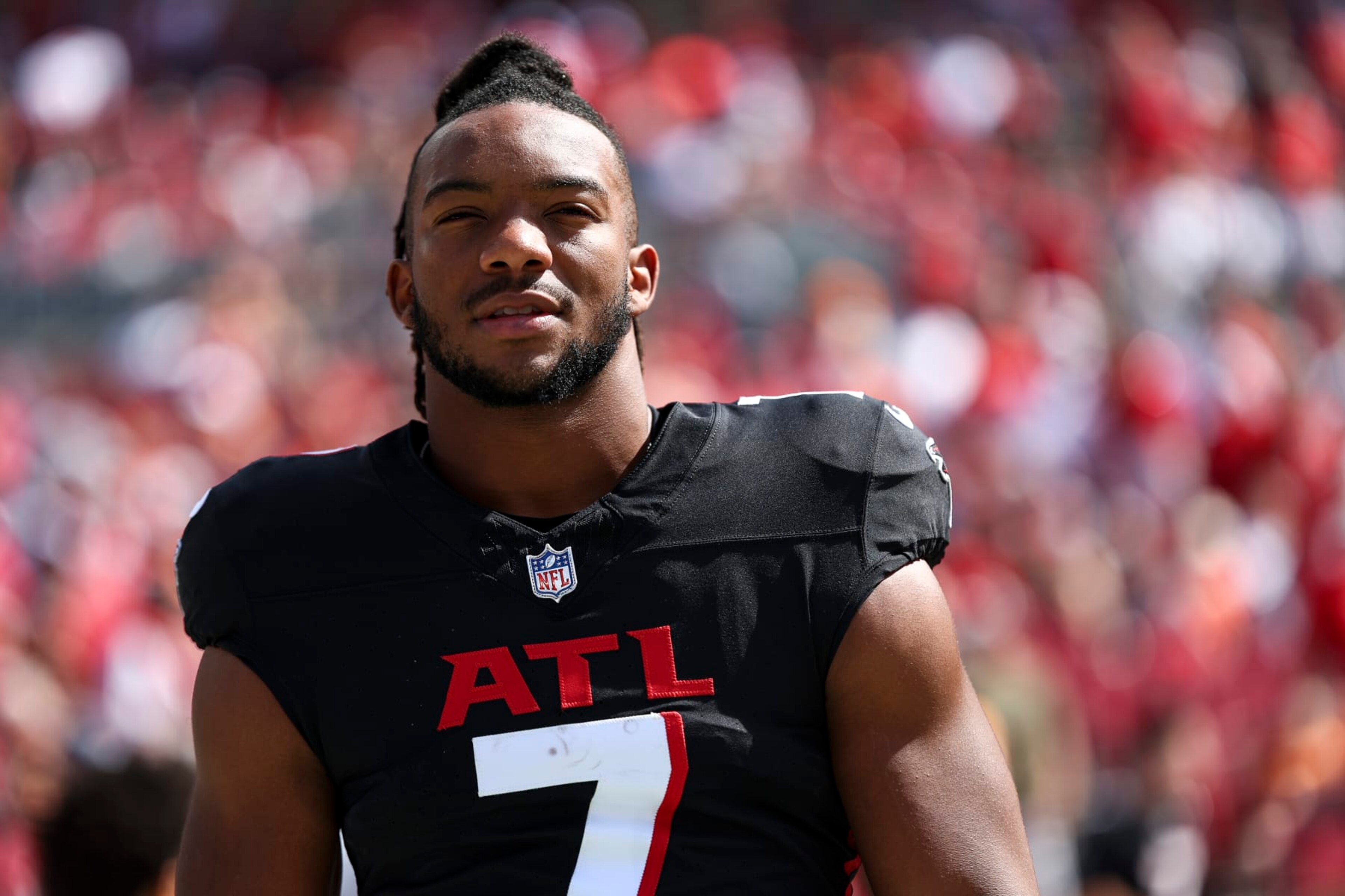 TAMPA, FL - OCTOBER 22: Bijan Robinson #7 of the Atlanta Falcons stands on the sidelines during the national anthem prior to an NFL football game against the Tampa Bay Buccaneers at Raymond James Stadium on October 22, 2023 in Tampa, Florida. (Photo by Kevin Sabitus/Getty Images)