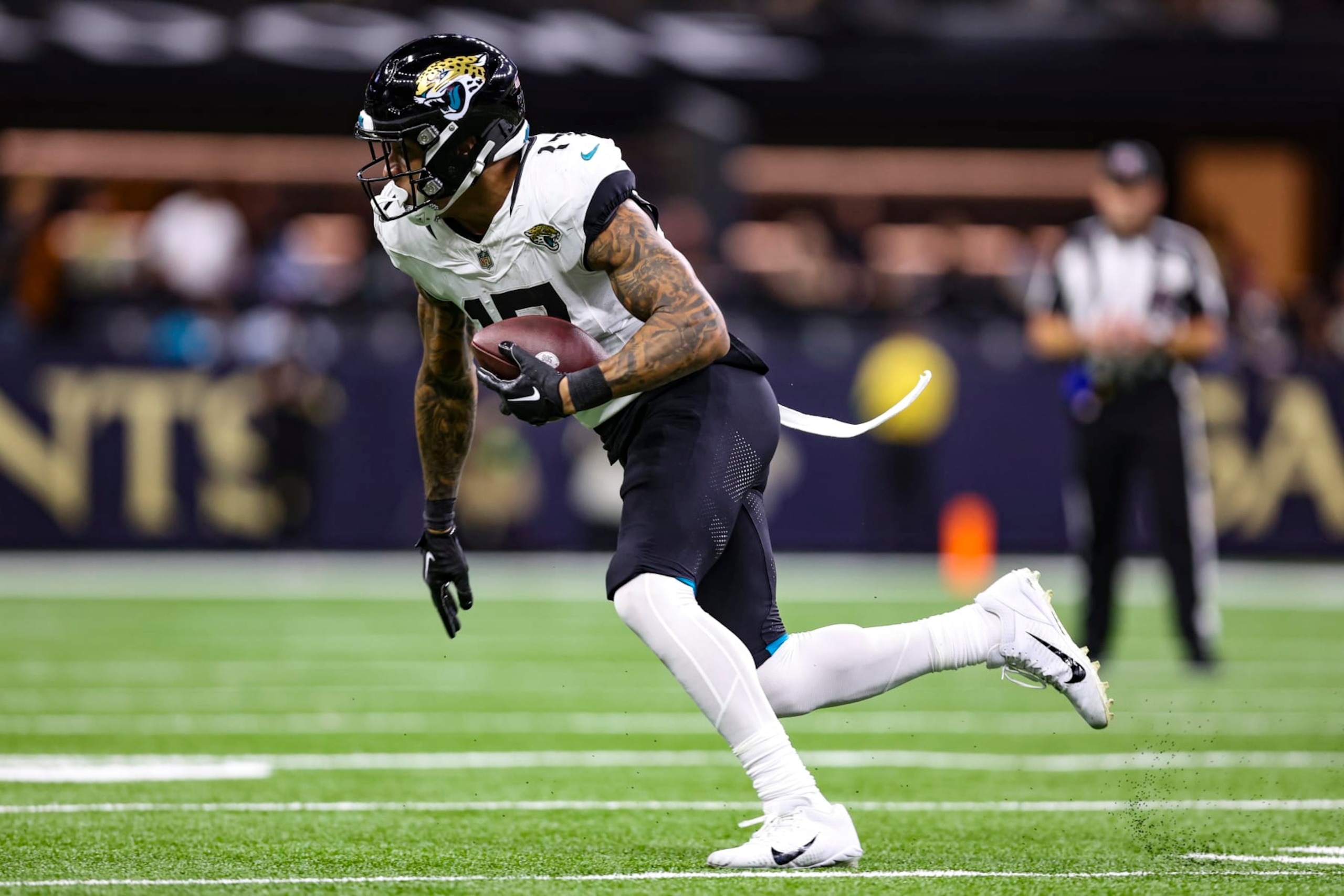 NEW ORLEANS, LA - OCTOBER 19: Evan Engram #17 of the Jacksonville Jaguars runs the ball during an NFL football game against the New Orleans Saints at Caesars Superdome on October 19, 2023 in New Orleans, Louisiana. (Photo by Perry Knotts/Getty Images)