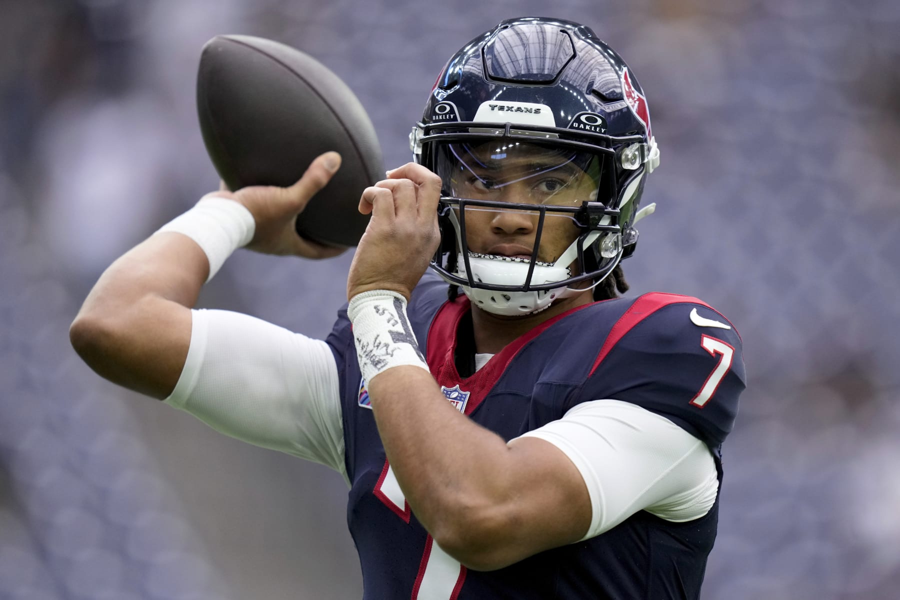 Houston Texans quarterback C.J. Stroud warms up before an NFL football game against the New Orleans Saints, Sunday, Oct. 15, 2023, in Houston. (AP Photo/Eric Christian Smith)