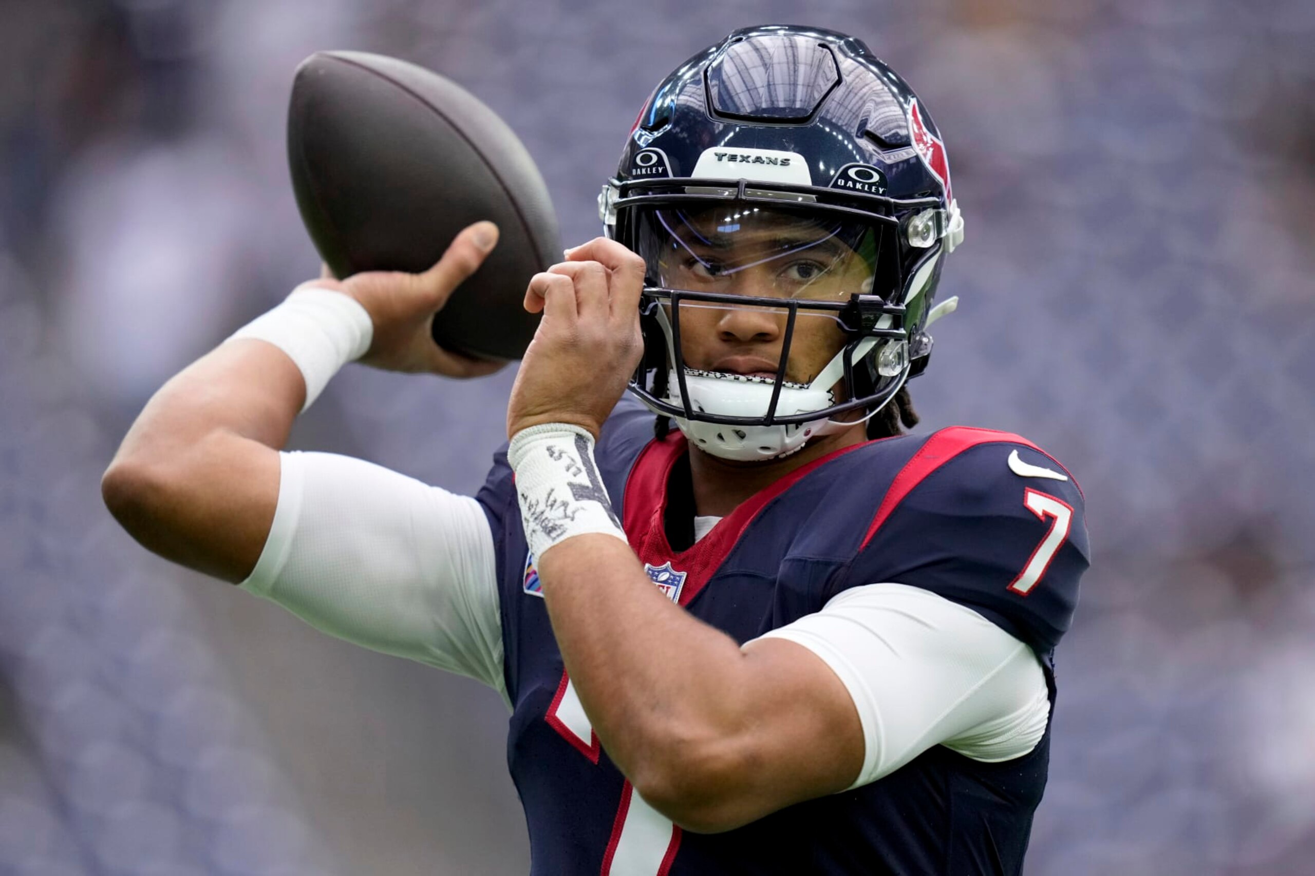 Houston Texans quarterback C.J. Stroud warms up before an NFL football game against the New Orleans Saints, Sunday, Oct. 15, 2023, in Houston. (AP Photo/Eric Christian Smith)