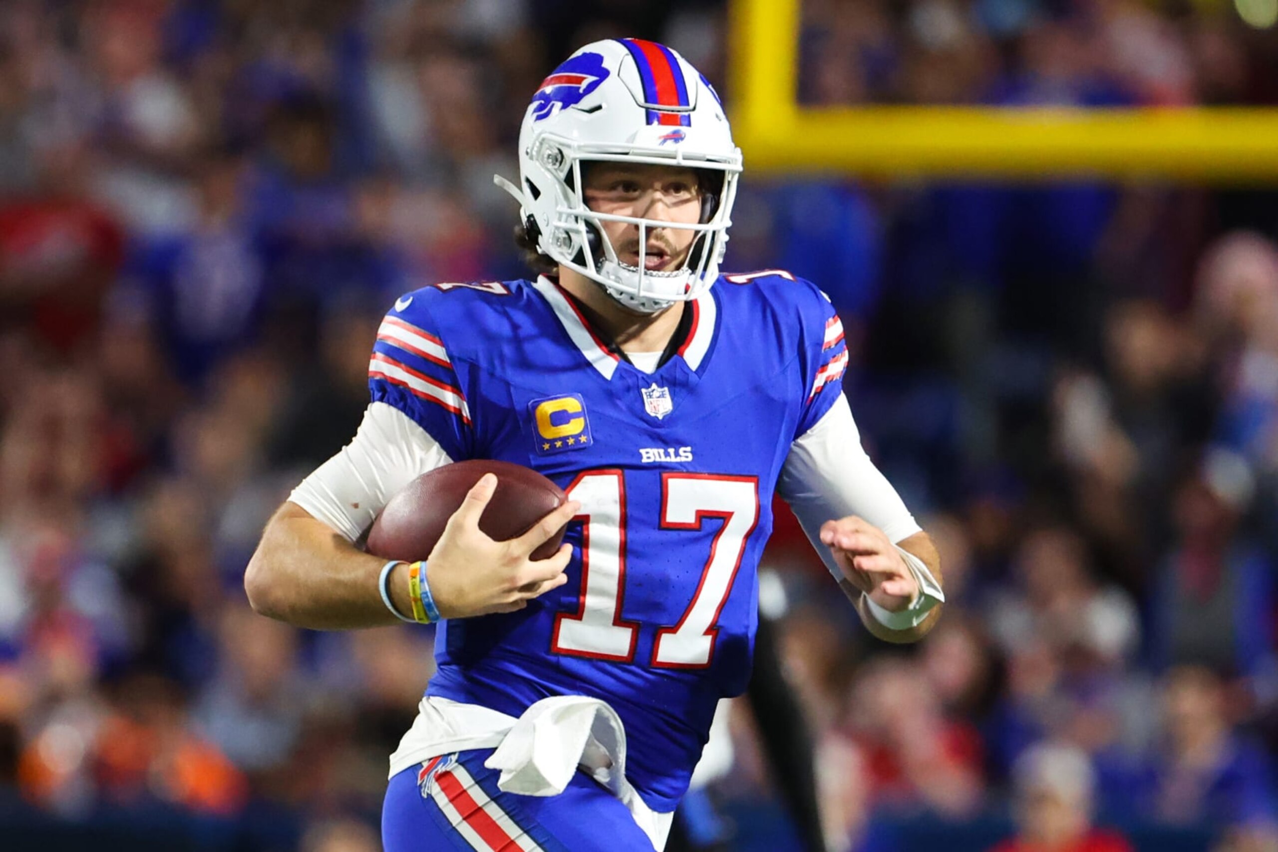 ORCHARD PARK, NEW YORK - OCTOBER 26: Josh Allen #17 of the Buffalo Bills carries the ball against the Tampa Bay Buccaneers during the third quarter of the game at Highmark Stadium on October 26, 2023 in Orchard Park, New York. (Photo by Timothy T Ludwig/Getty Images)