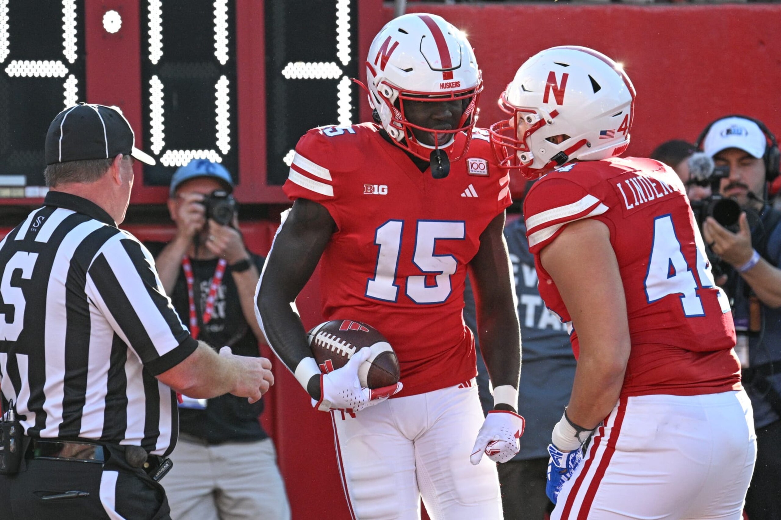 LINCOLN, NEBRASKA - OCTOBER 21: Wide receiver Malachi Coleman #15 of the Nebraska Cornhuskers celebrates with tight end Luke Lindenmeyer #44 after scoring against the Northwestern Wildcats in the fourth quarter  at Memorial Stadium on October 21, 2023 in Lincoln, Nebraska. (Photo by Steven Branscombe/Getty Images)