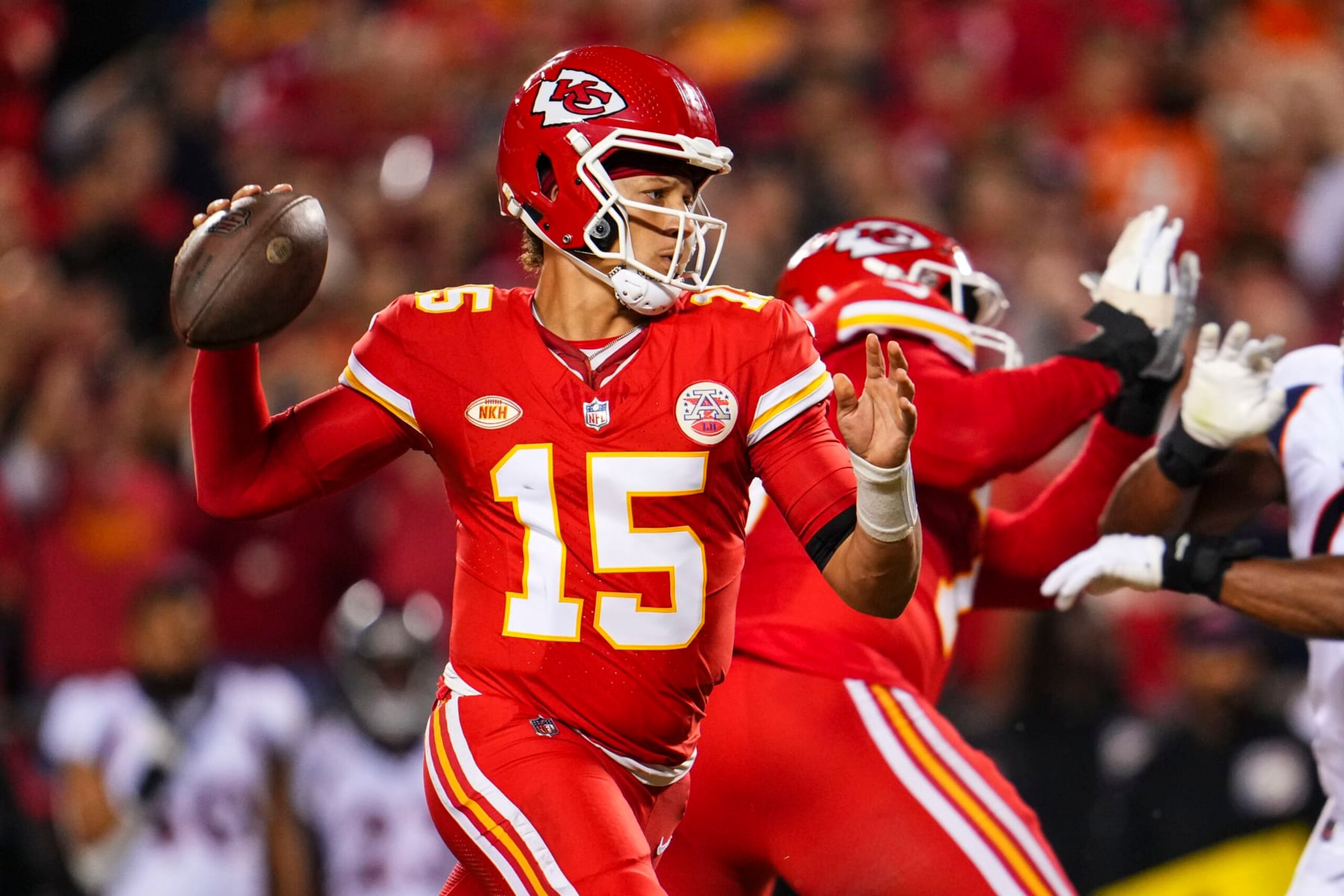 KANSAS CITY, MO - OCTOBER 12: Patrick Mahomes #15 of the Kansas City Chiefs throws the ball during an NFL football game against the Denver Broncos at GEHA Field at Arrowhead Stadium on October 12, 2023 in Kansas City, Missouri. (Photo by Cooper Neill/Getty Images)