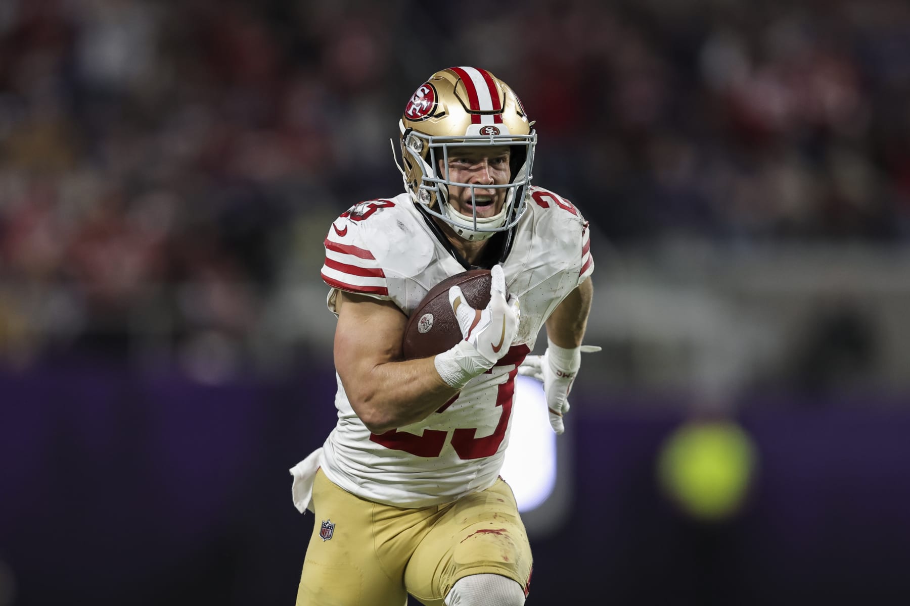 MINNEAPOLIS, MINNESOTA - OCTOBER 23: Christian McCaffrey #23 of the San Francisco 49ers runs with the ball for a touchdown during an NFL football game between the Minnesota Vikings and the San Francisco 49ers at U.S. Bank Stadium on October 23, 2023 in Minneapolis, Minnesota. (Photo by Michael Owens/Getty Images)