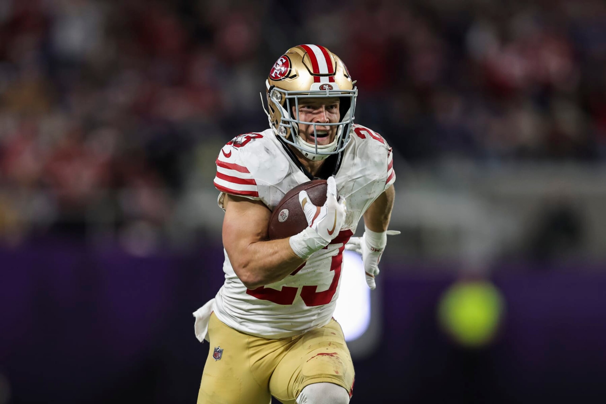 MINNEAPOLIS, MINNESOTA - OCTOBER 23: Christian McCaffrey #23 of the San Francisco 49ers runs with the ball for a touchdown during an NFL football game between the Minnesota Vikings and the San Francisco 49ers at U.S. Bank Stadium on October 23, 2023 in Minneapolis, Minnesota. (Photo by Michael Owens/Getty Images)