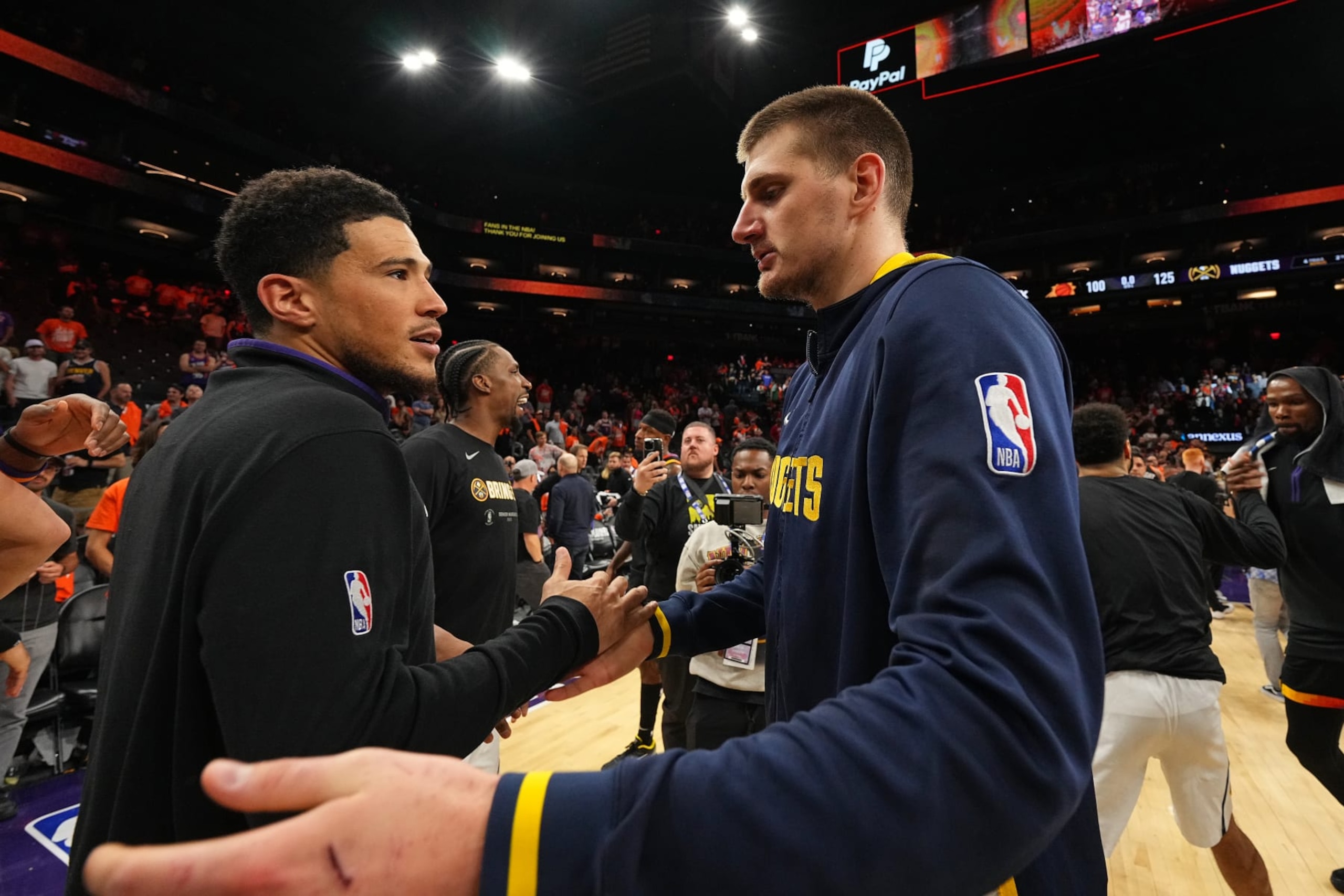Devin Booker and Nikola JokiÄ