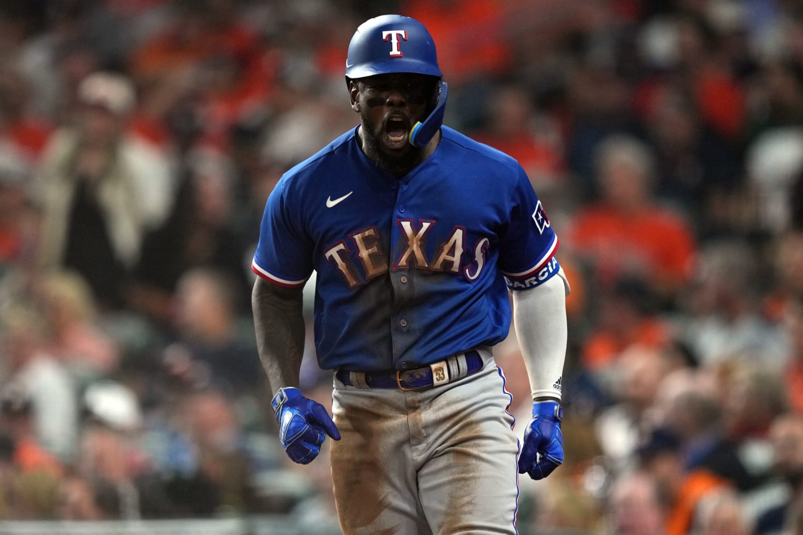 HOUSTON, TX - OCTOBER 23: Adolis García #53 of the Texas Rangers celebrates after hitting a home run in the third inning during Game 7 of the ALCS between the Texas Rangers and the Houston Astros at Minute Maid Park on Monday, October 23, 2023 in Houston, Texas. (Photo by Alex Bierens de Haan/MLB Photos via Getty Images)