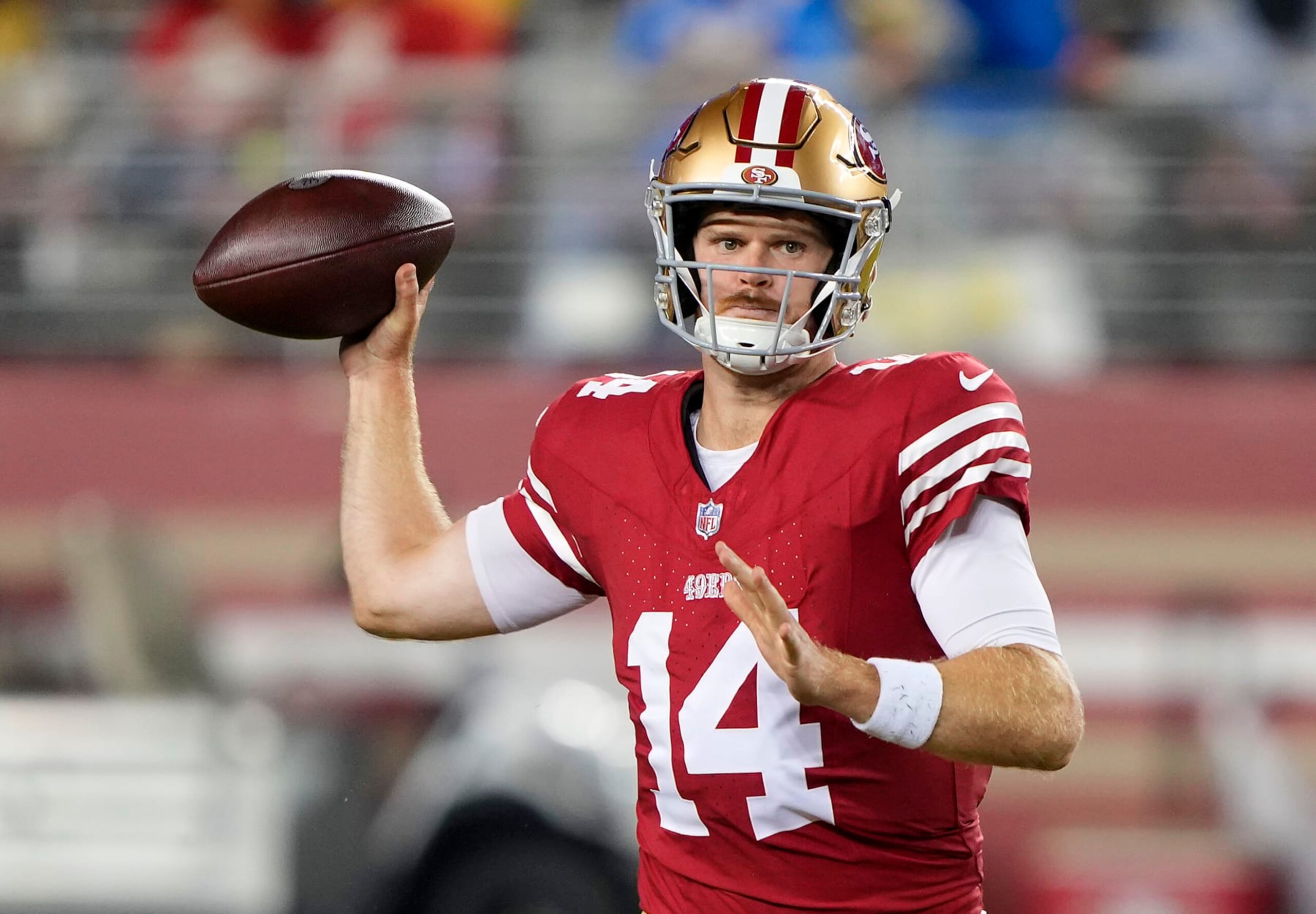 SANTA CLARA, CALIFORNIA - AUGUST 25: Sam Darnold #14 of the San Francisco 49ers drops back to pass against the Los Angeles Chargers during the second quarter of a preseason game at Levi's Stadium on August 25, 2023 in Santa Clara, California. (Photo by Thearon W. Henderson/Getty Images)