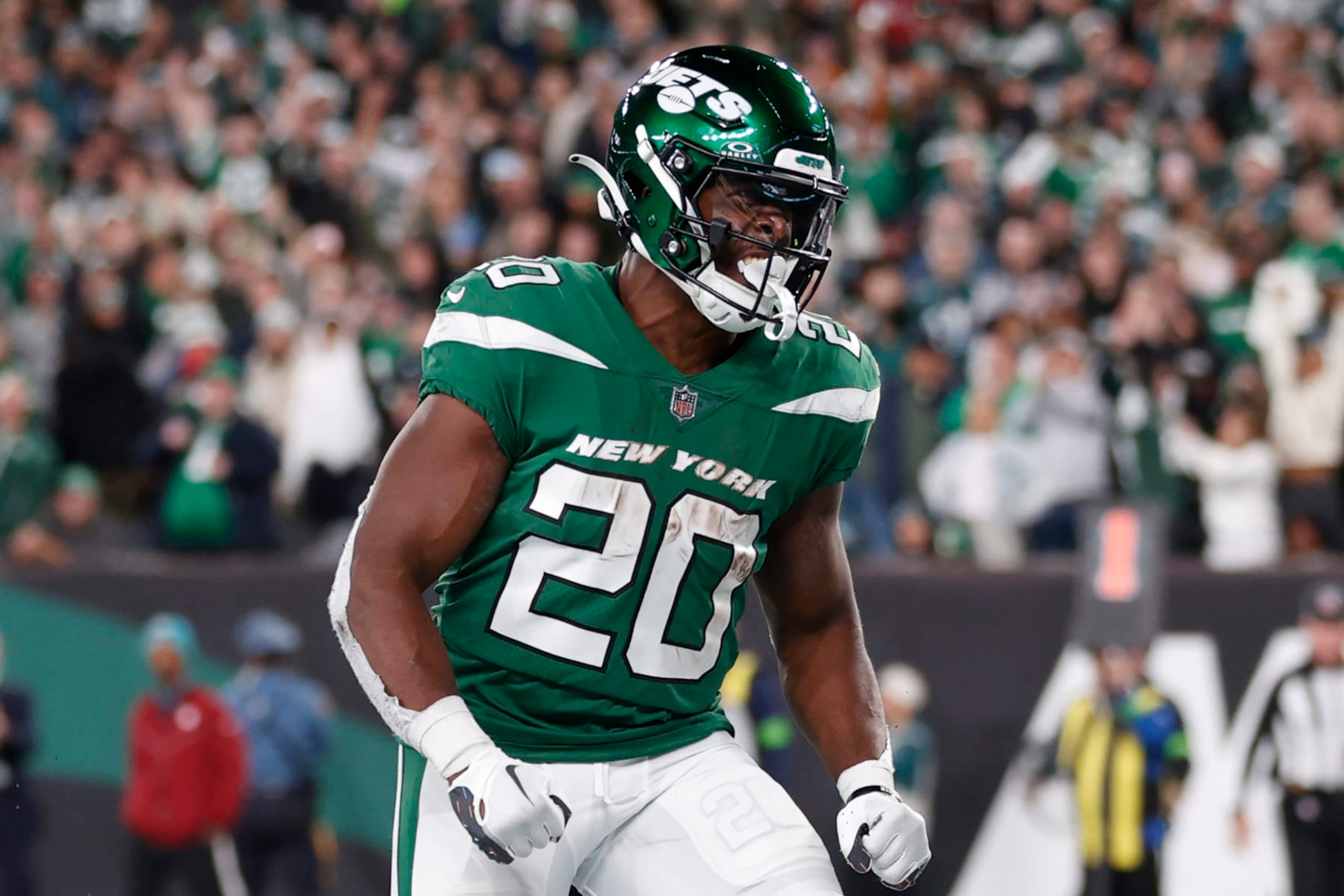 EAST RUTHERFORD, NEW JERSEY - OCTOBER 15: Breece Hall #20 of the New York Jets celebrates a touchdown during the fourth quarter in the game against the Philadelphia Eagles at MetLife Stadium on October 15, 2023 in East Rutherford, New Jersey. (Photo by Sarah Stier/Getty Images)