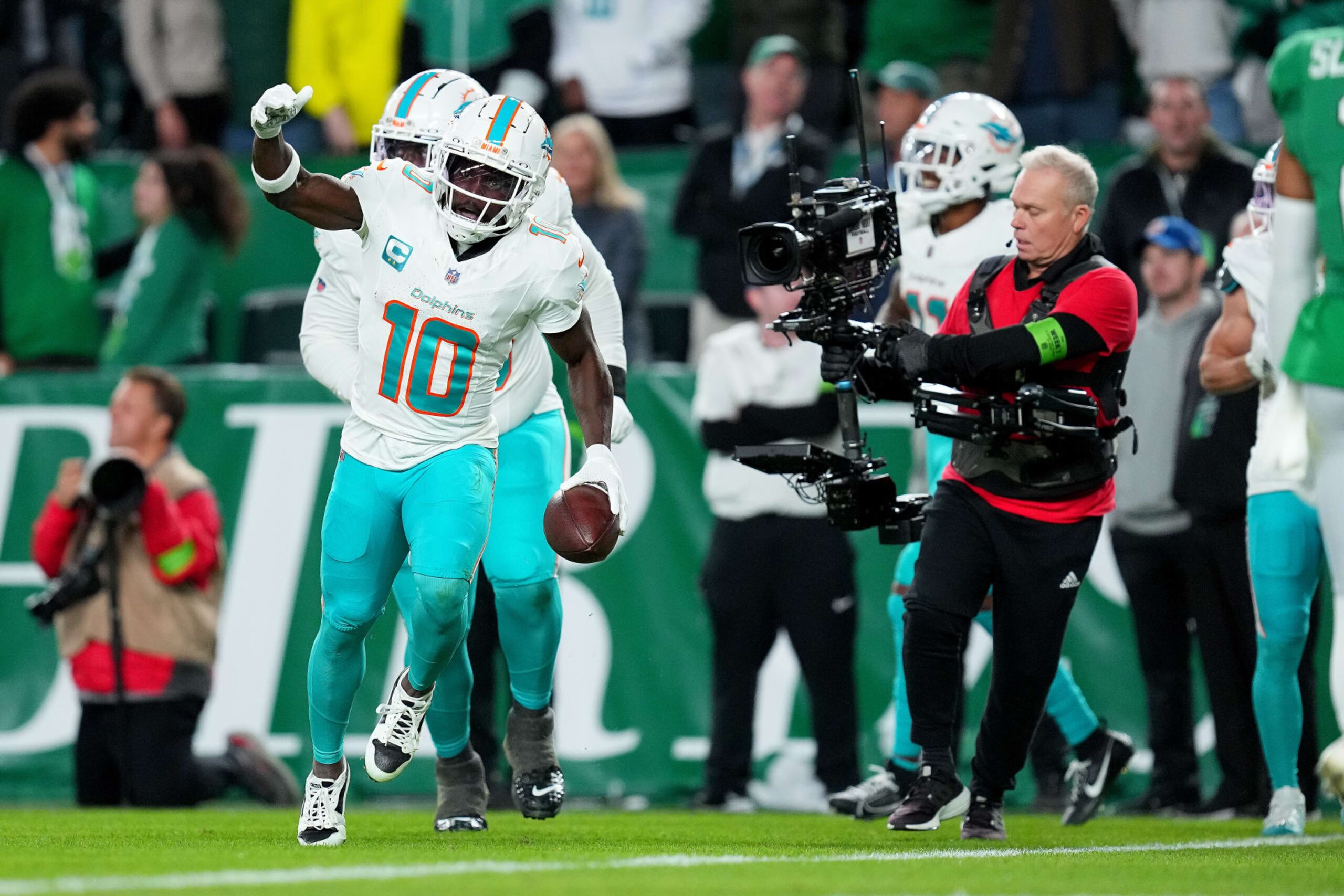 PHILADELPHIA, PENNSYLVANIA - OCTOBER 22: Tyreek Hill #10 of the Miami Dolphins reacts after scoring a touchdown during the first half of a game against the Philadelphia Eagles at Lincoln Financial Field on October 22, 2023 in Philadelphia, Pennsylvania. (Photo by Mitchell Leff/Getty Images)