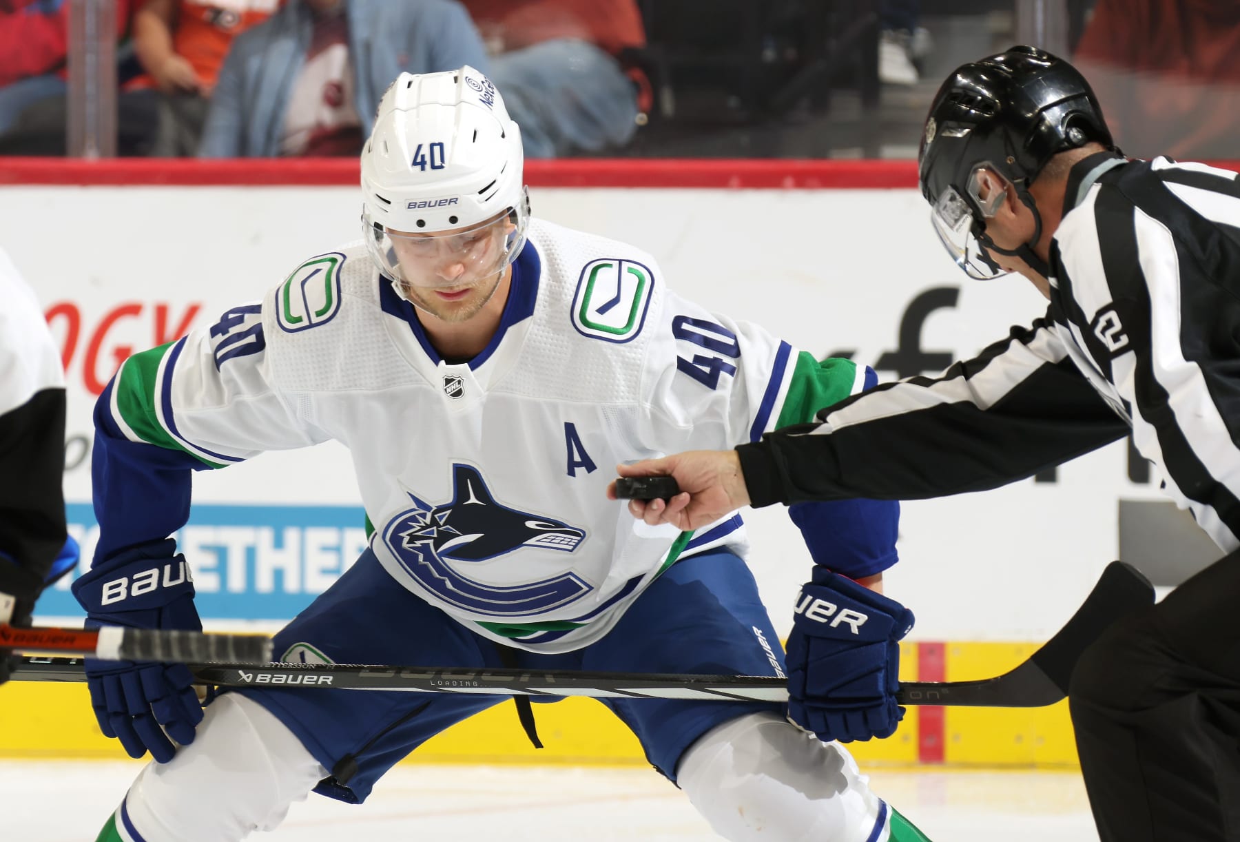 PHILADELPHIA, PENNSYLVANIA - OCTOBER 17:  Elias Pettersson #40 of the Vancouver Canucks keeps his eye on the puck prior to facing off against the Philadelphia Flyers at the Wells Fargo Center on October 17, 2023 in Philadelphia, Pennsylvania.  (Photo by Len Redkoles/NHLI via Getty Images)
