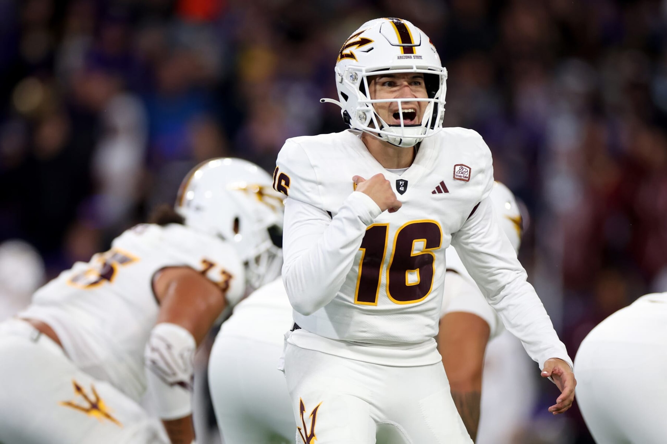 SEATTLE, WASHINGTON - OCTOBER 21: Trenton Bourguet #16 of the Arizona State Sun Devils calls a play against the Washington Huskies during the second quarter at Husky Stadium on October 21, 2023 in Seattle, Washington. (Photo by Steph Chambers/Getty Images)