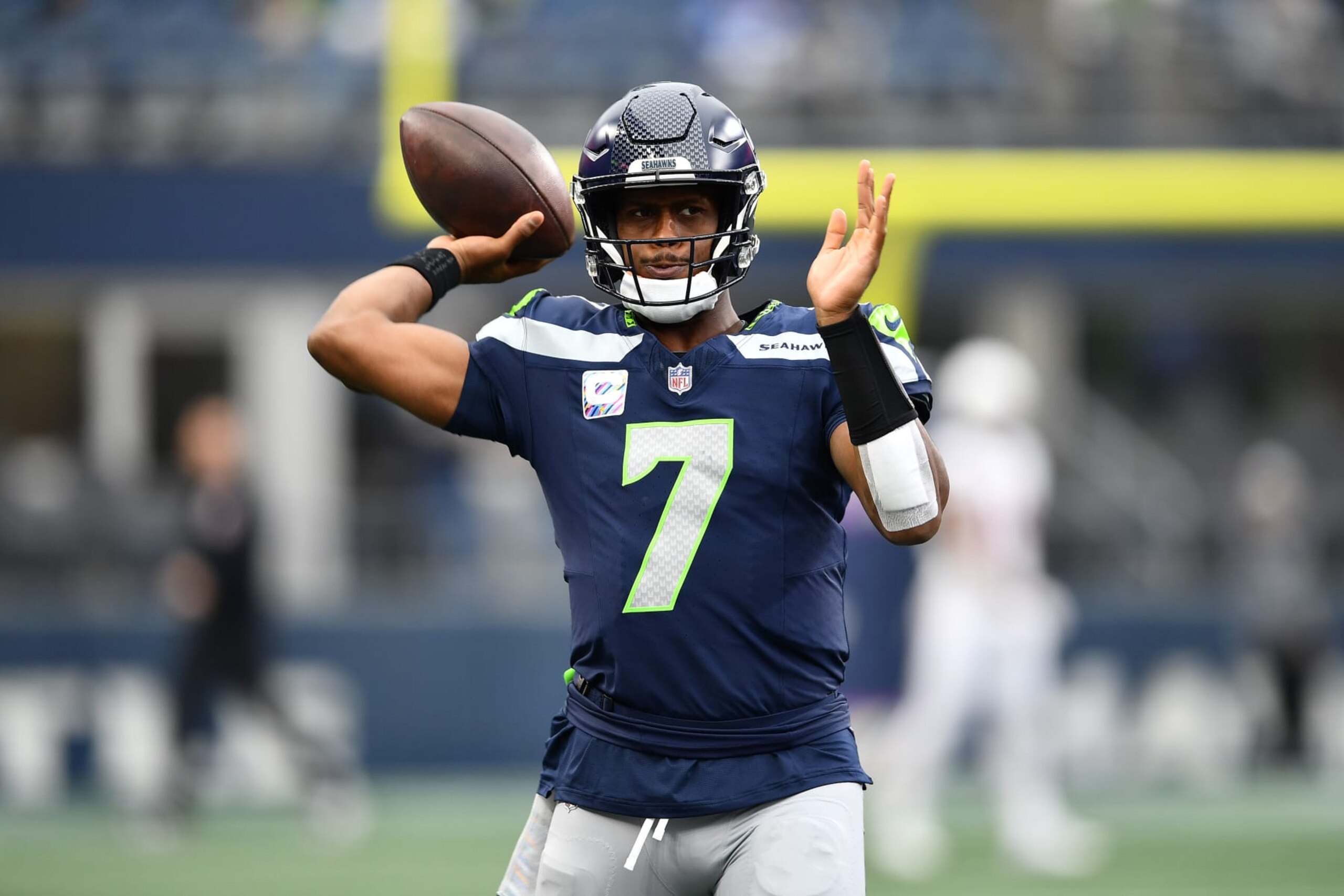 SEATTLE, WASHINGTON - OCTOBER 22: Geno Smith #7 of the Seattle Seahawks warms up before the game against the Arizona Cardinals at Lumen Field on October 22, 2023 in Seattle, Washington. (Photo by Jane Gershovich/Getty Images)