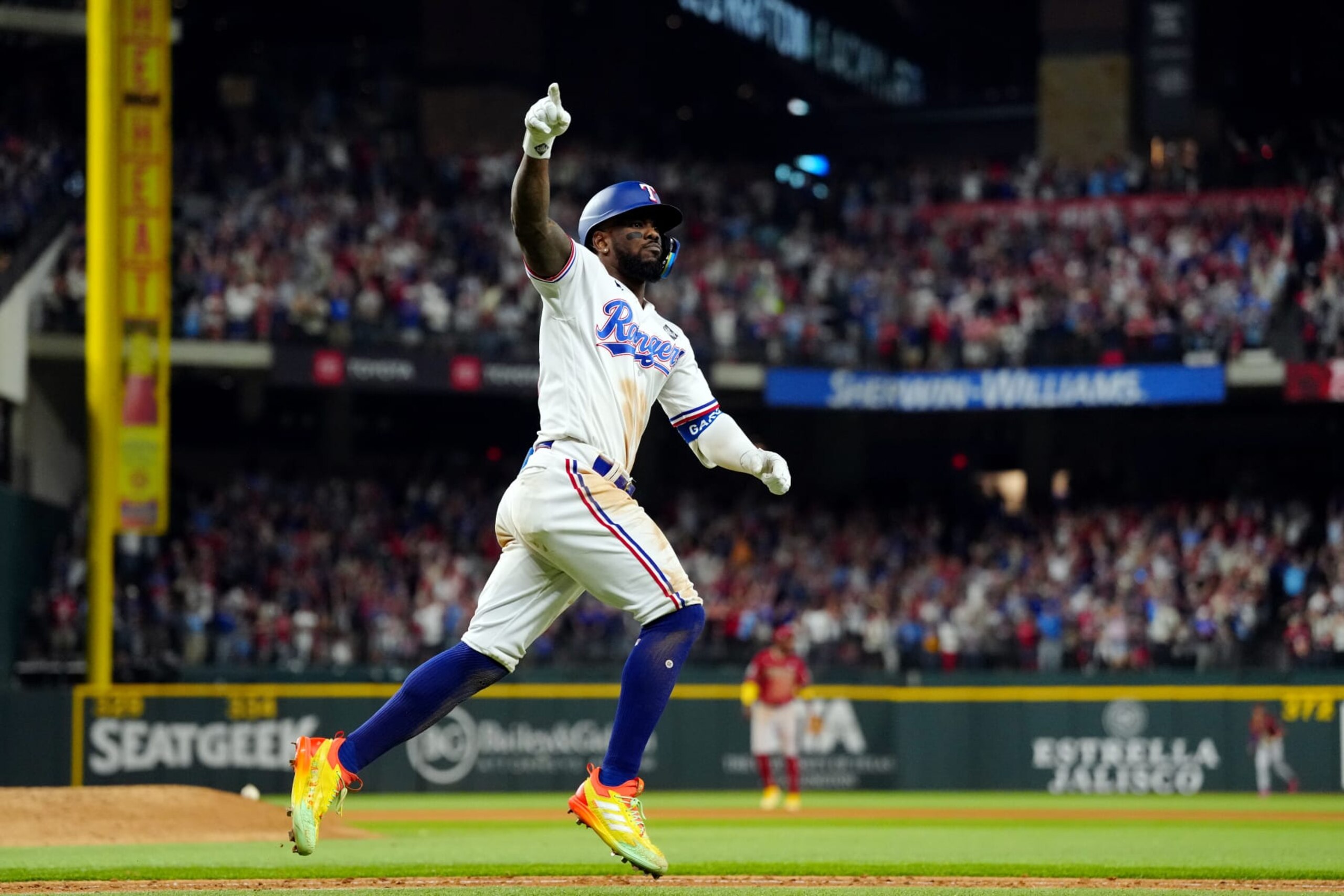 ARLINGTON, TX - OCTOBER 27:  Adolis García #53 of the Texas Rangers rounds the bases after hitting a walk-off home run to defeat the Arizona Diamondbacks in Game 1 of the 2023 World Series at Globe Life Field on Friday, October 27, 2023 in Arlington, Texas. (Photo by Daniel Shirey/MLB Photos via Getty Images)