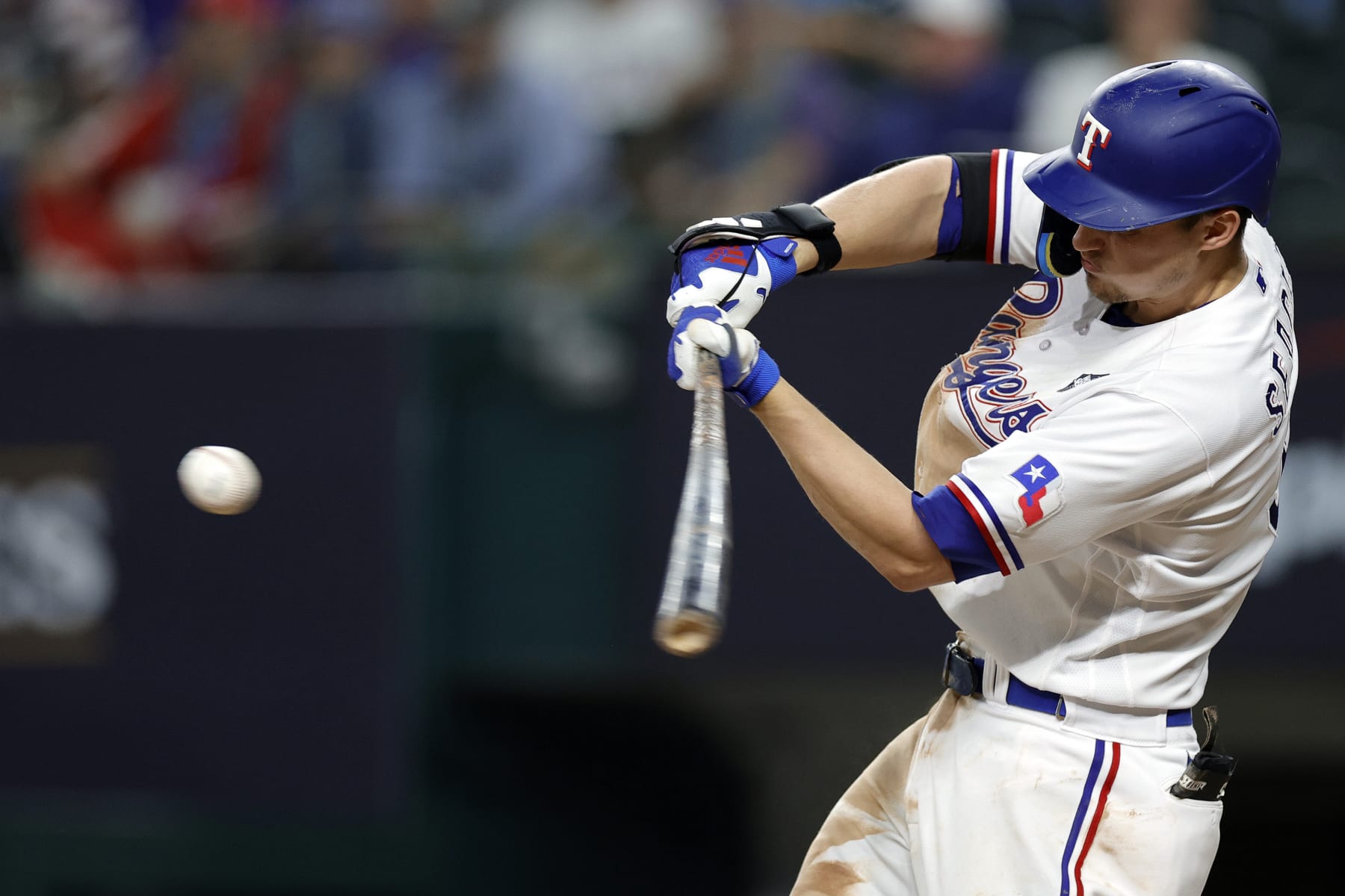 ARLINGTON, TEXAS - OCTOBER 27: Corey Seager #5 of the Texas Rangers hits a home run in the ninth inning against the Arizona Diamondbacks during Game One of the World Series at Globe Life Field on October 27, 2023 in Arlington, Texas. (Photo by Carmen Mandato/Getty Images)