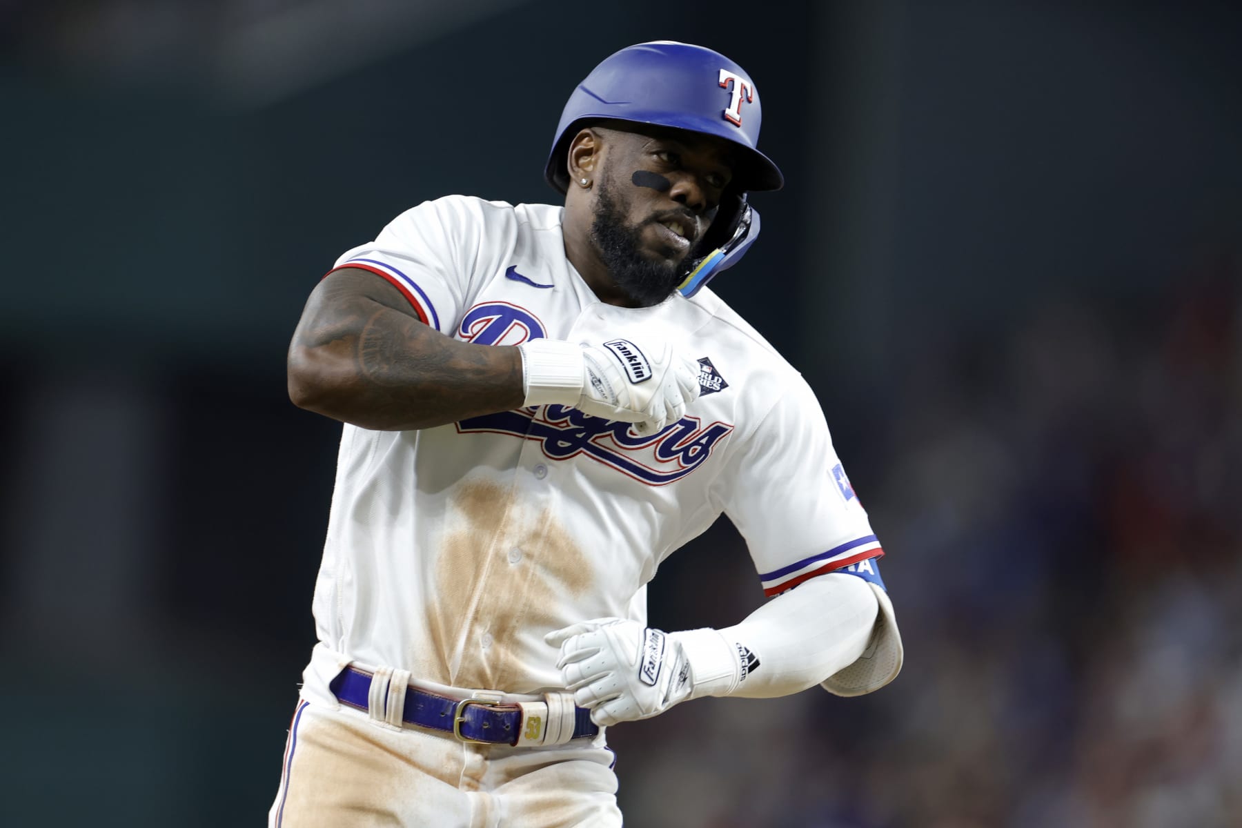 ARLINGTON, TEXAS - OCTOBER 27: Adolis García #53 of the Texas Rangers celebrates as he rounds the bases after hitting a home run in the 11th inning to beat the Arizona Diamondbacks 6-5 in Game One of the World Series at Globe Life Field on October 27, 2023 in Arlington, Texas. (Photo by Carmen Mandato/Getty Images)