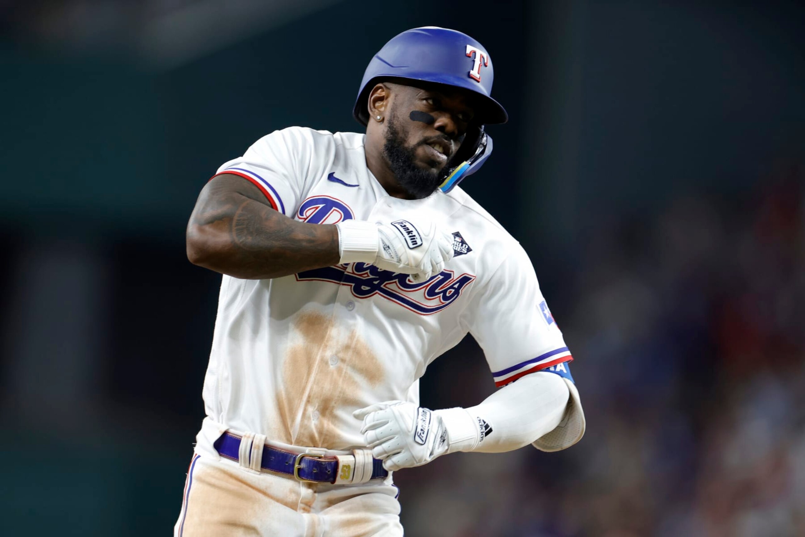 ARLINGTON, TEXAS - OCTOBER 27: Adolis García #53 of the Texas Rangers celebrates as he rounds the bases after hitting a home run in the 11th inning to beat the Arizona Diamondbacks 6-5 in Game One of the World Series at Globe Life Field on October 27, 2023 in Arlington, Texas. (Photo by Carmen Mandato/Getty Images) ARLINGTON, TEXAS - OCTOBER 27: Adolis García #53 of the Texas Rangers celebrates as he rounds the bases after hitting a home run in the 11th inning to beat the Arizona Diamondbacks 6-5 in Game One of the World Series at Globe Life Field on October 27, 2023 in Arlington, Texas. (Photo by Carmen Mandato/Getty Images)