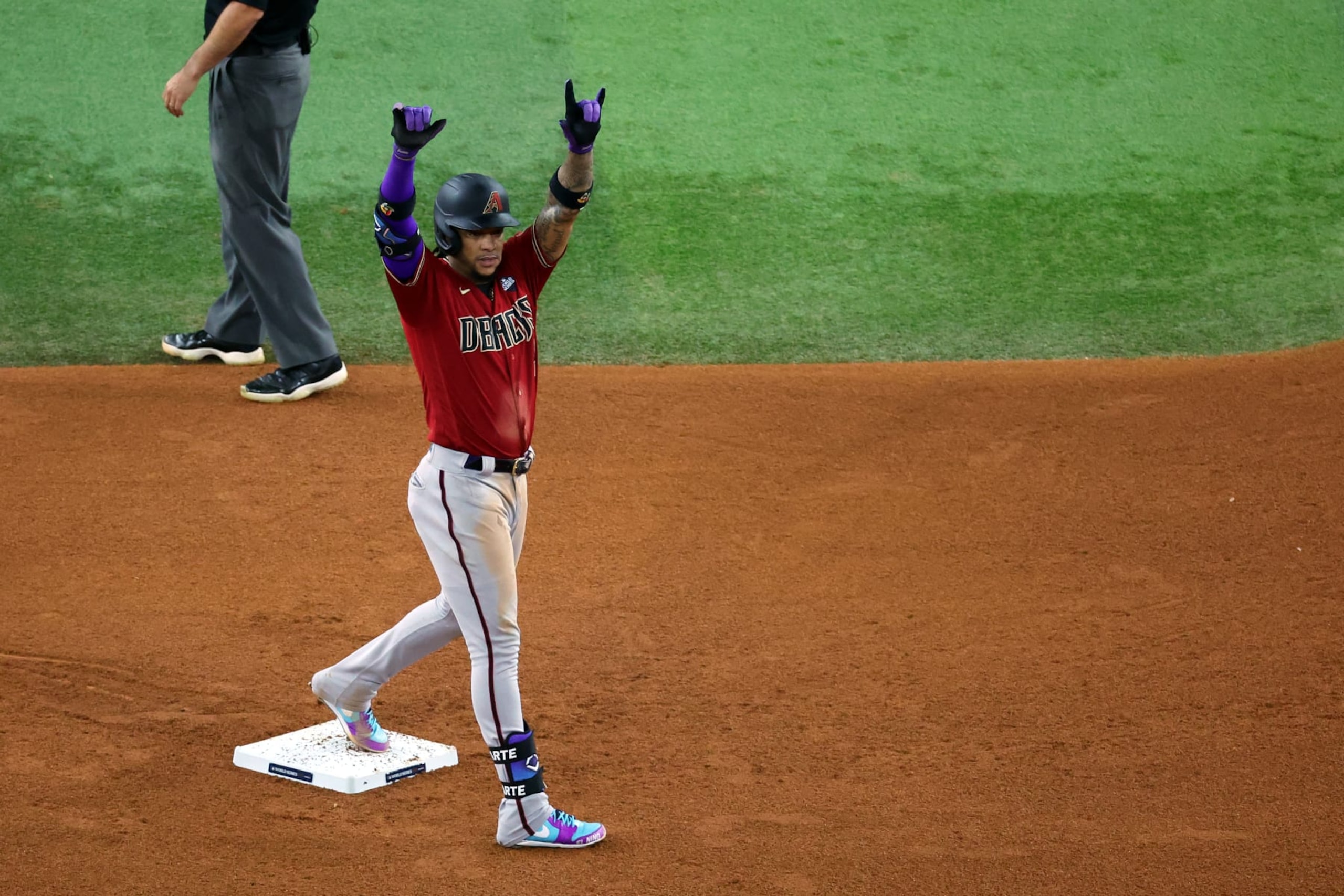 ARLINGTON, TEXAS - OCTOBER 27: Ketel Marte #4 of the Arizona Diamondbacks celebrates after hitting a double in the fifth inning against the Texas Rangers during Game One of the World Series at Globe Life Field on October 27, 2023 in Arlington, Texas. (Photo by Stacy Revere/Getty Images) ARLINGTON, TEXAS - OCTOBER 27: Ketel Marte #4 of the Arizona Diamondbacks celebrates after hitting a double in the fifth inning against the Texas Rangers during Game One of the World Series at Globe Life Field on October 27, 2023 in Arlington, Texas. (Photo by Stacy Revere/Getty Images)