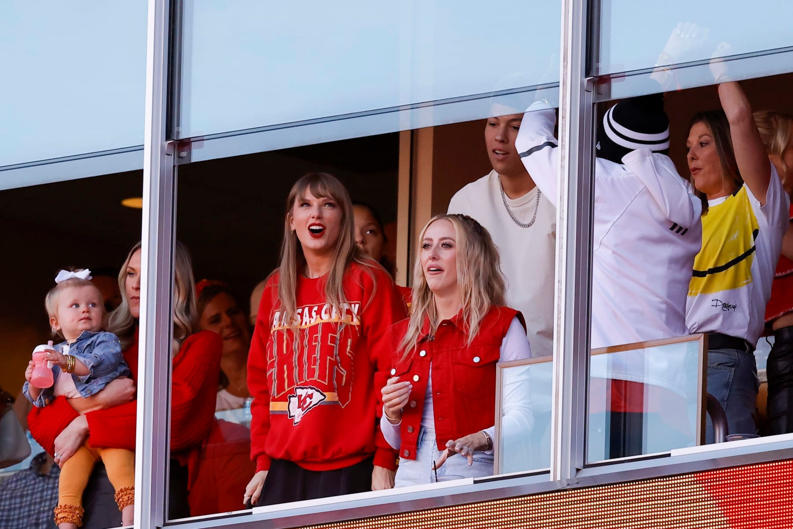KANSAS CITY, MISSOURI - OCTOBER 22: Taylor Swift and Brittany Mahomes react to a touchdown scored by Travis Kelce #87 of the Kansas City Chiefs during the second quarter of the game against the Los Angeles Chargers at GEHA Field at Arrowhead Stadium on October 22, 2023 in Kansas City, Missouri. (Photo by David Eulitt/Getty Images)