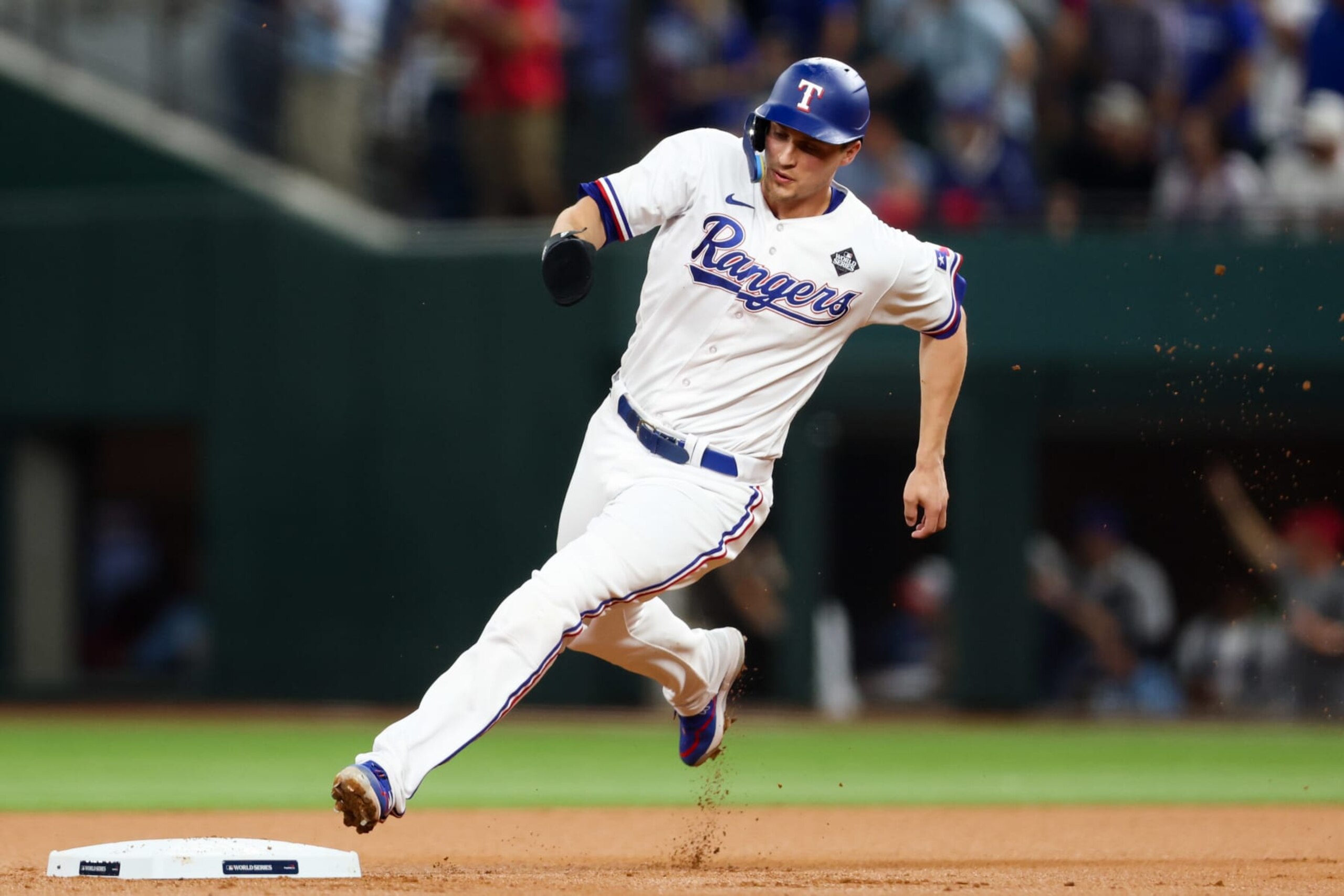 ARLINGTON, TX - OCTOBER 27: Corey Seager #5 of the Texas Rangers rounds third base to score off a double from Evan Carter #32 in the first inning during Game 1 of the 2023 World Series between the Arizona Diamondbacks and the Texas Rangers at Globe Life Field on Friday, October 27, 2023 in Arlington, Texas. (Photo by Rob Tringali/MLB Photos via Getty Images) ARLINGTON, TX - OCTOBER 27: Corey Seager #5 of the Texas Rangers rounds third base to score off a double from Evan Carter #32 in the first inning during Game 1 of the 2023 World Series between the Arizona Diamondbacks and the Texas Rangers at Globe Life Field on Friday, October 27, 2023 in Arlington, Texas. (Photo by Rob Tringali/MLB Photos via Getty Images)