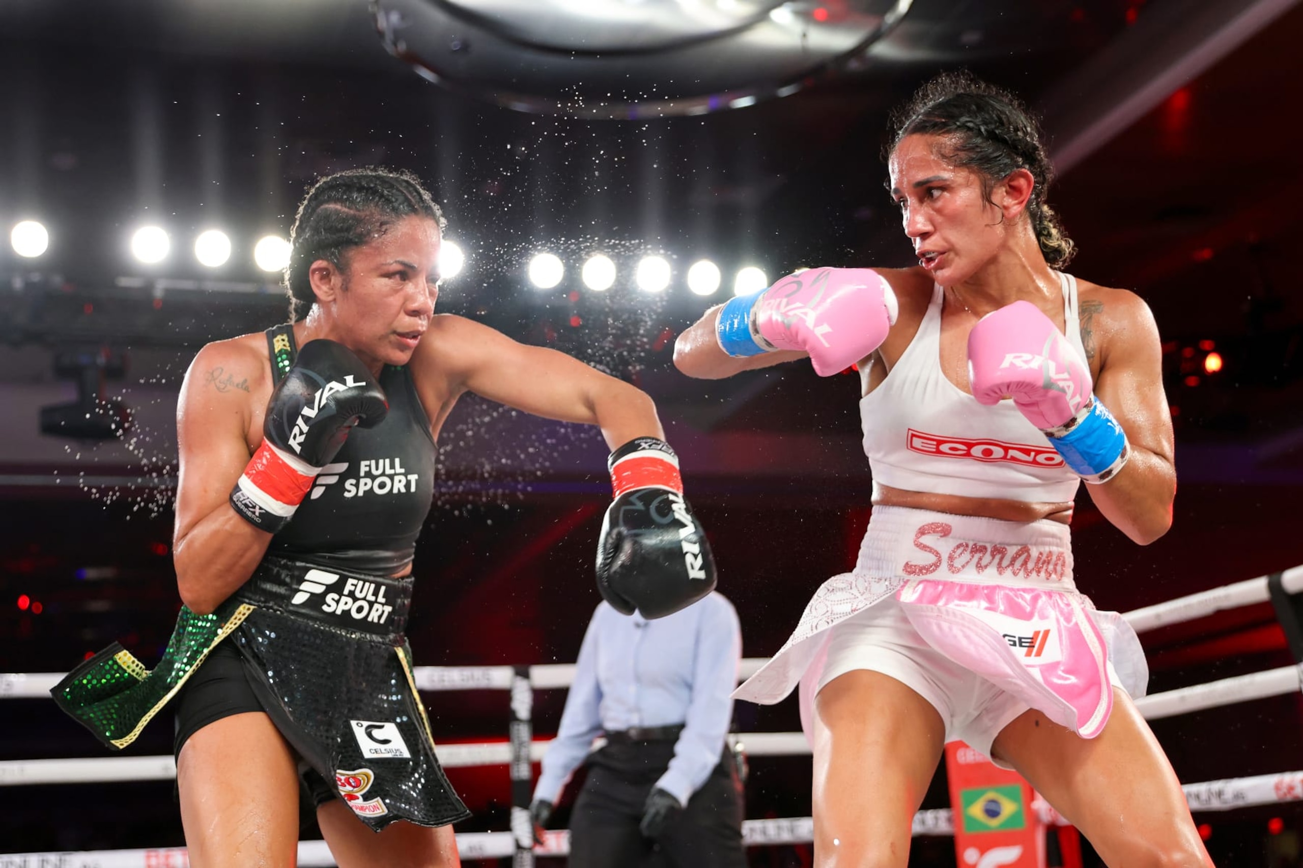 ORLANDO, FL - OCTOBER 27: Amanda Serrano (R) exchanges punches with Danila Ramos during the MVP boxing match at the Caribe Royale Orlando resort on October 27, 2023 in Orlando, Florida. (Photo by Alex Menendez/Getty Images)