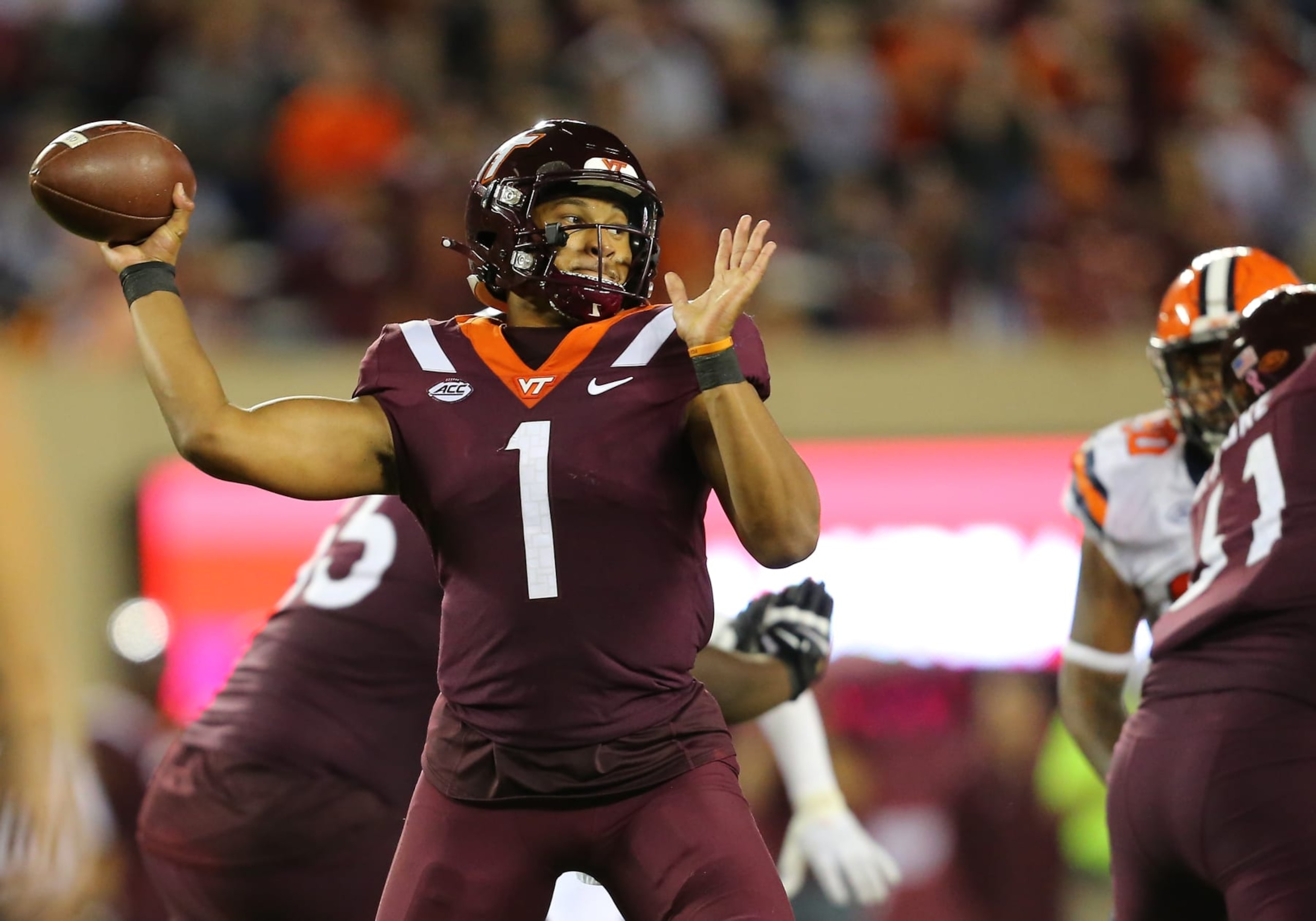 BLACKSBURG, VA - OCTOBER 26: Virginia Tech Hokies quarterback Kyron Drones (1) throws a pass from the pocket during a college football game between the Syracuse Orange and the Virginia Tech Hokies on October 26, 2023, at Lane Stadium in Blacksburg, VA. (Photo by Lee Coleman/Icon Sportswire via Getty Images)