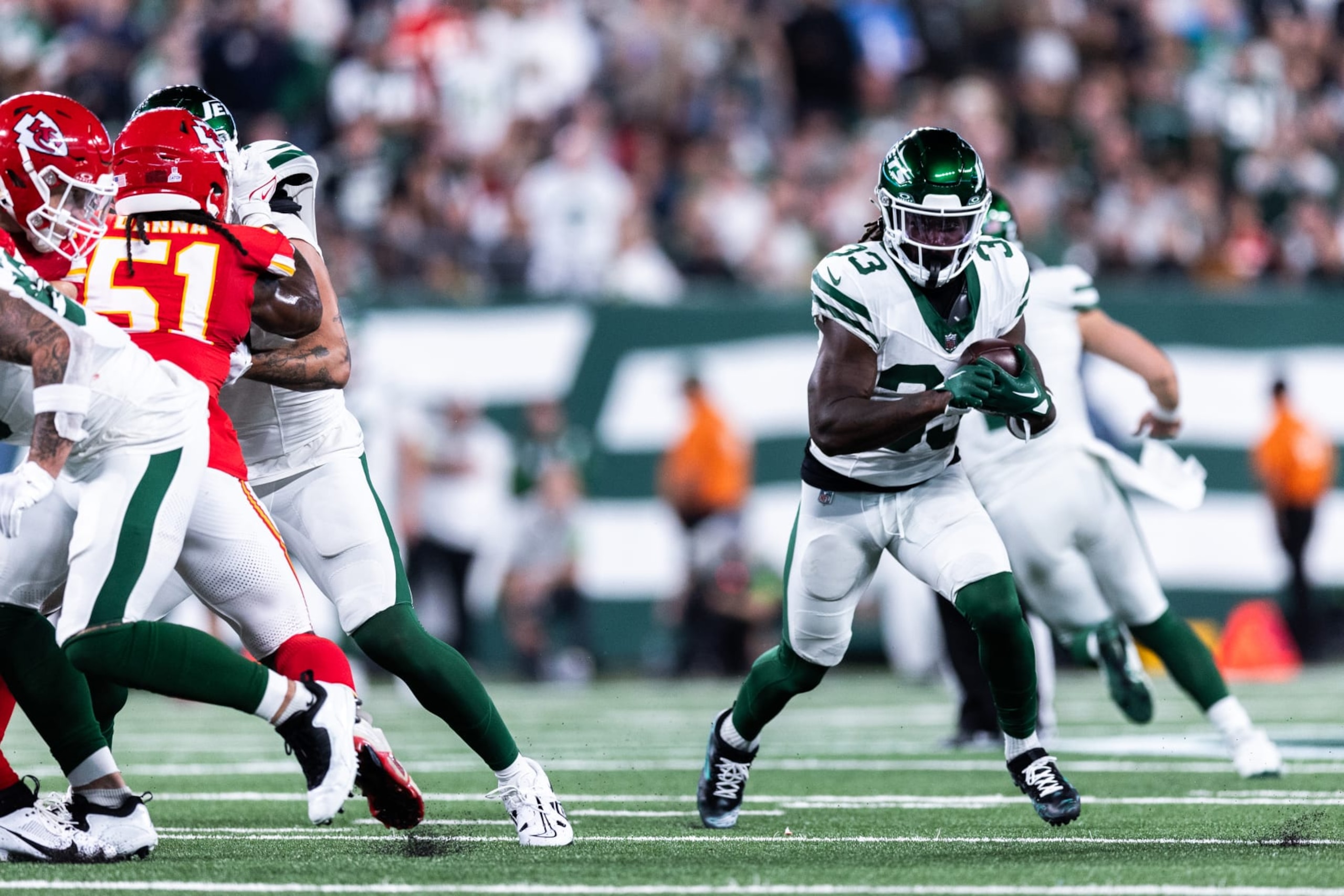 EAST RUTHERFORD, NEW JERSEY - OCTOBER 01: Dalvin Cook #33 of the New York Jets carries the ball during the second quarter of the game against the Kansas City Chiefs at MetLife Stadium on October 01, 2023 in East Rutherford, New Jersey. (Photo by Dustin Satloff/Getty Images)