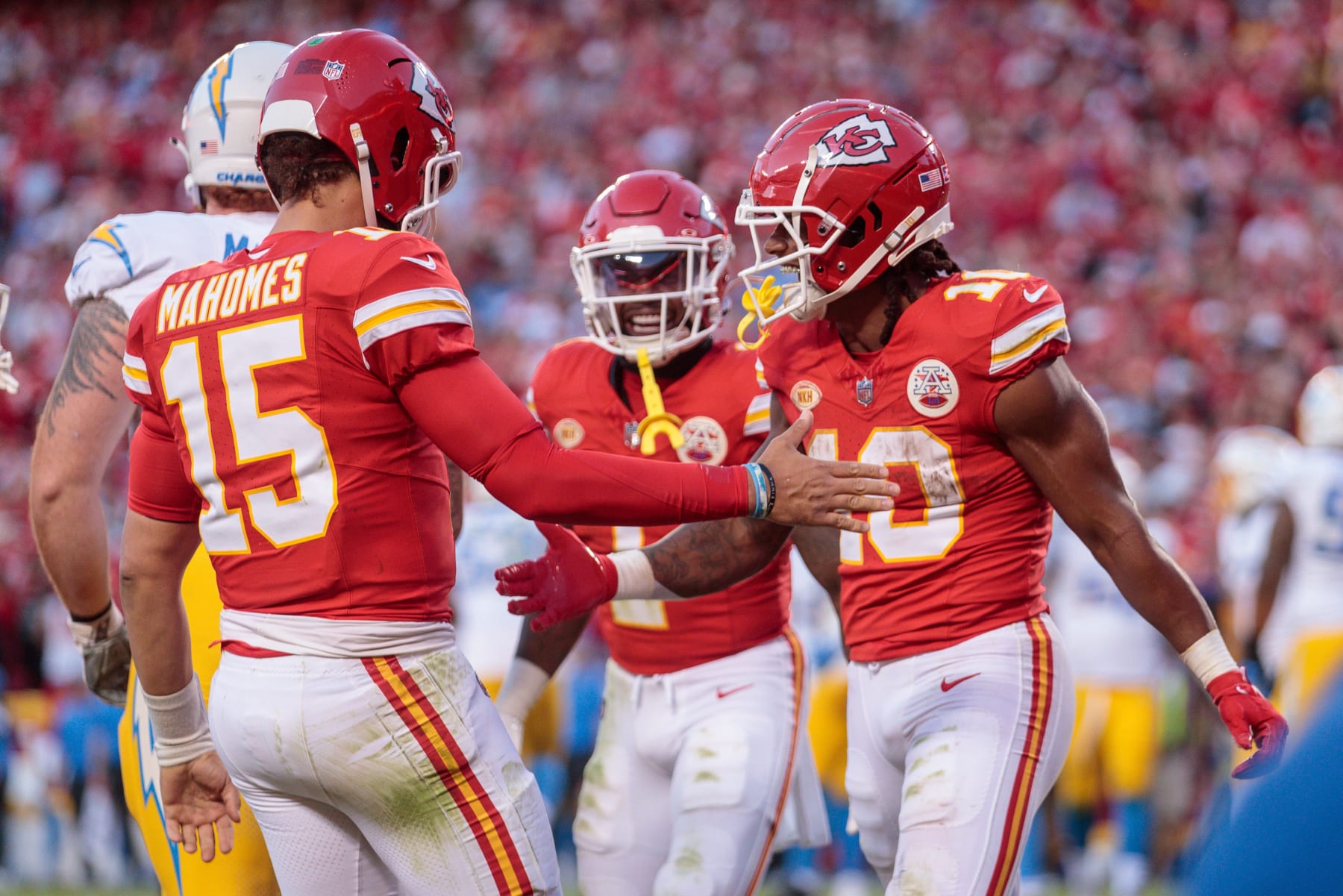 KANSAS CITY, MO - OCTOBER 22: Kansas City Chiefs quarterback Patrick Mahomes (15) congratulates Kansas City Chiefs running back Isiah Pacheco (10) after a touchdown during the second half against the Los Angeles Chargers on October 22, 2023 at GEHA Field at Arrowhead Stadium in Kansas City, Missouri. (Photo by William Purnell/Icon Sportswire via Getty Images)