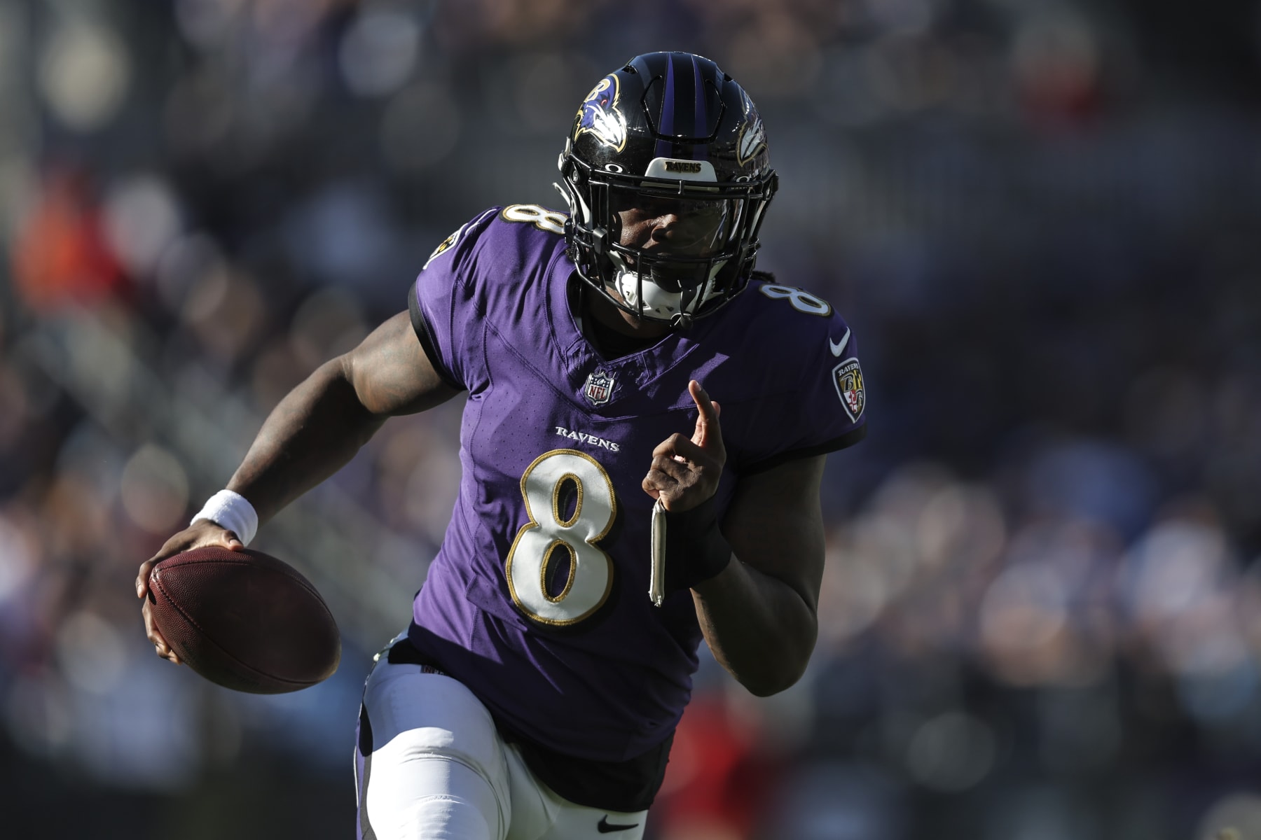 BALTIMORE, MARYLAND - OCTOBER 22: Lamar Jackson #8 of the Baltimore Ravens scrambles and runs with the ball during an NFL football game between the Baltimore Ravens and the Detroit Lions at M&T Bank Stadium on October 22, 2023 in Baltimore, Maryland. (Photo by Michael Owens/Getty Images)