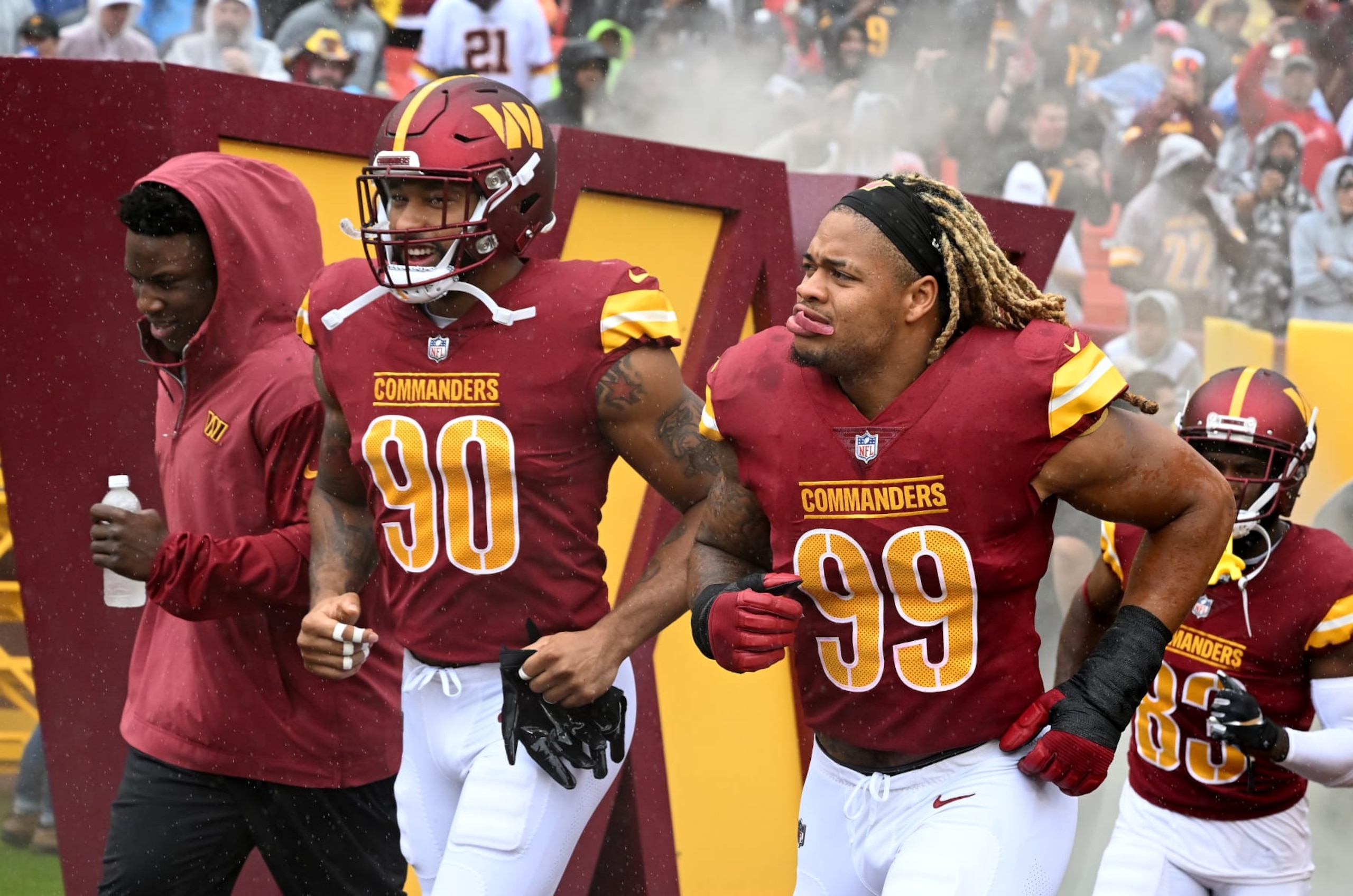 LANDOVER, MARYLAND - SEPTEMBER 24: Montez Sweat #90 and Chase Young #99 of the Washington Commanders run onto the field before the game against the Buffalo Bills at FedExField on September 24, 2023 in Landover, Maryland. (Photo by G Fiume/Getty Images) LANDOVER, MARYLAND - SEPTEMBER 24: Montez Sweat #90 and Chase Young #99 of the Washington Commanders run onto the field before the game against the Buffalo Bills at FedExField on September 24, 2023 in Landover, Maryland. (Photo by G Fiume/Getty Images)